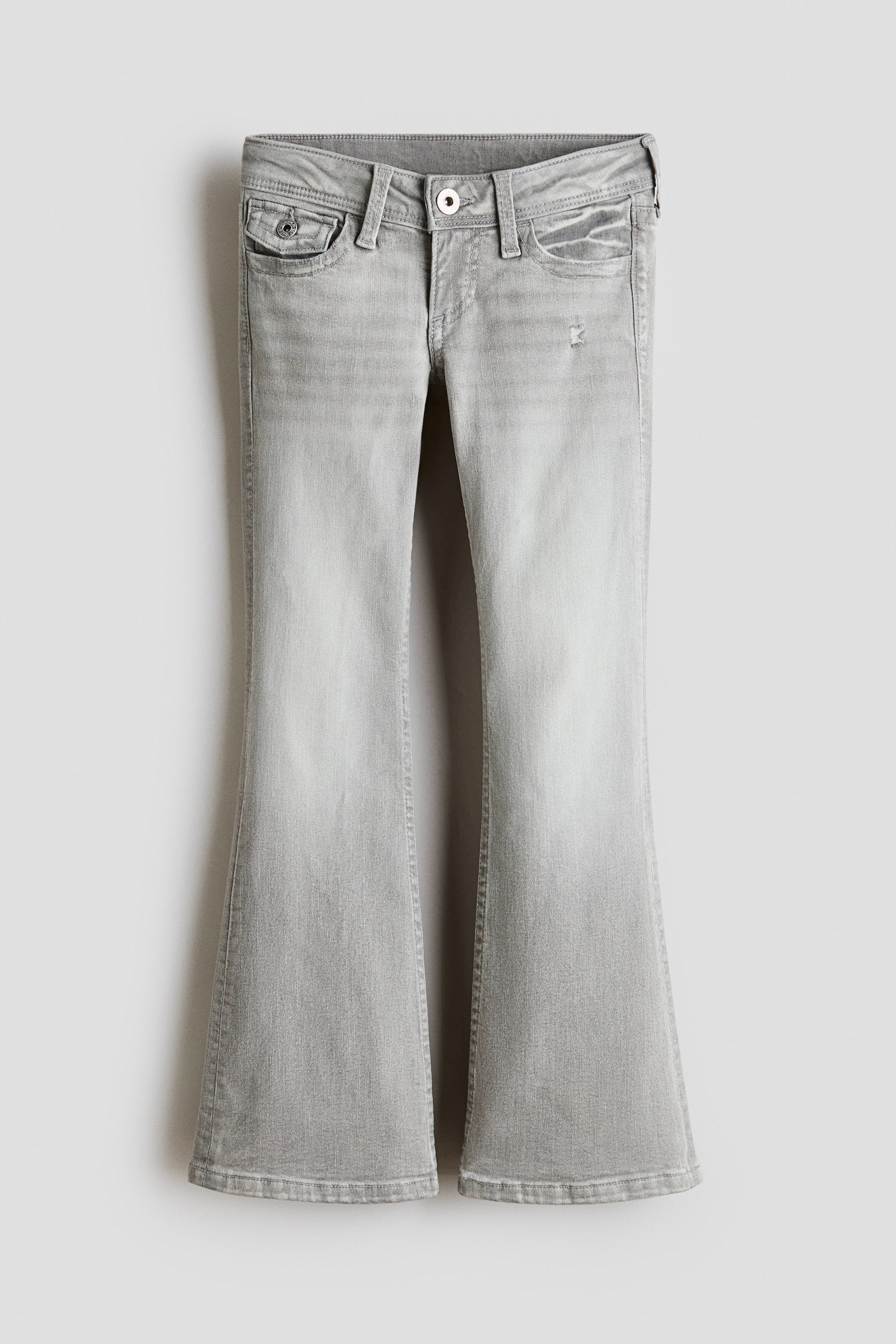 Jean évasé taille basse à motifs brodés