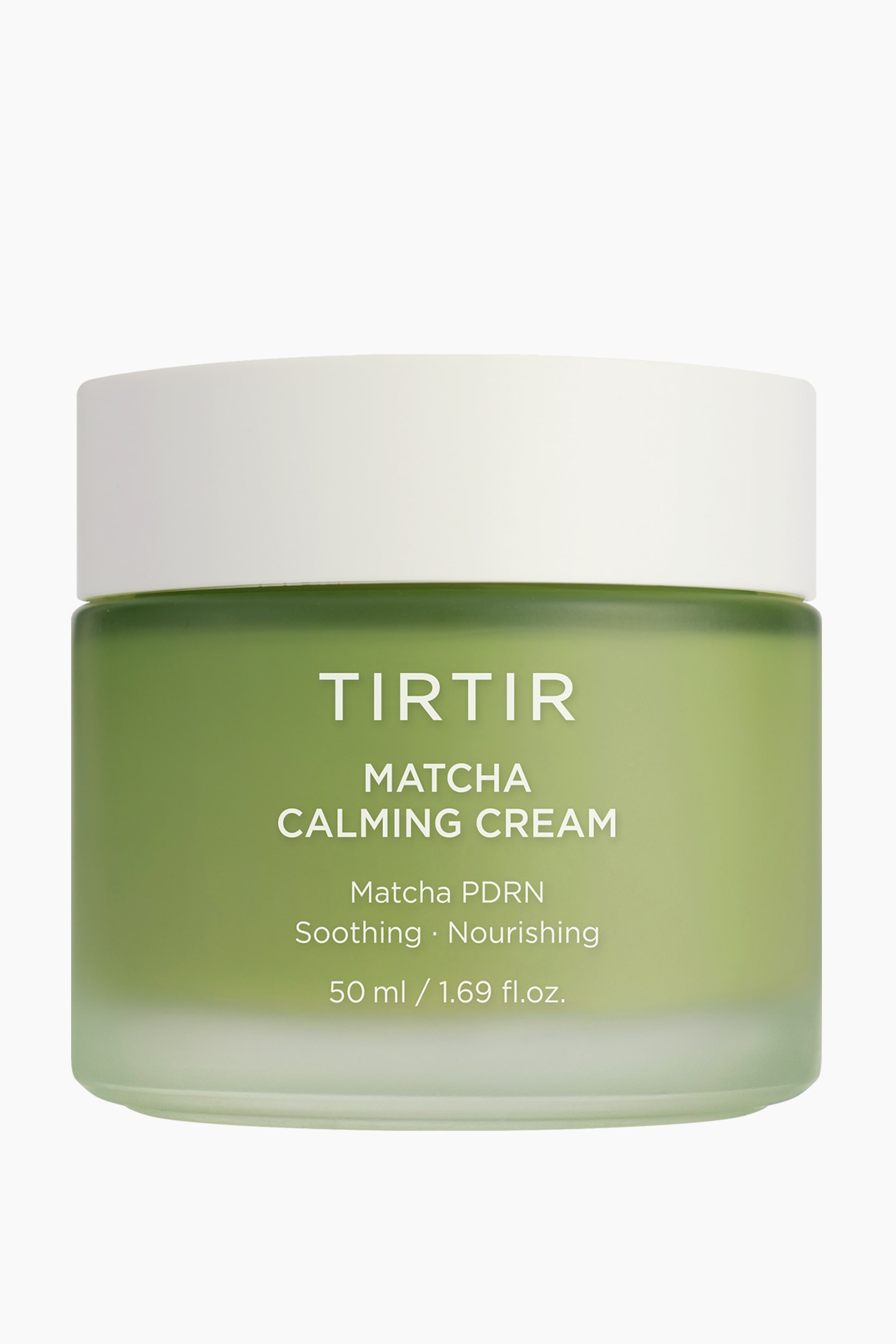 Vis større bilde: En TIRTIR Matcha Calming Cream-krukke viser sin forside, med en frostet grønn kropp som subtilt går over til klar nederst. Hvit tekst på krukken leser "TIRTIR MATCHA CALMING CREAM," "Matcha PDRN," "Soothing • Nourishing," og "50 ml / 1.69 fl.oz.," og den er toppet med et solid hvitt lokk."