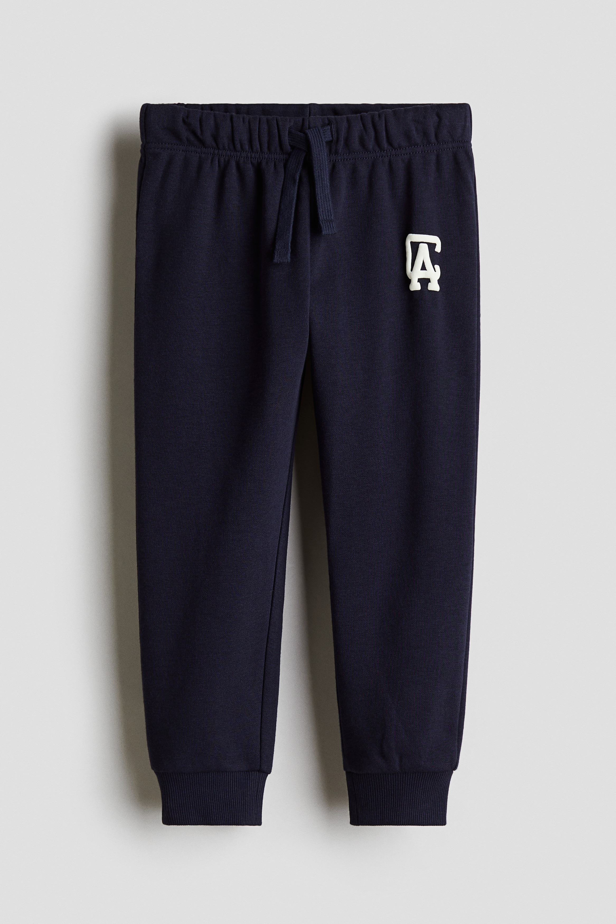 Painokuvalliset joggersit - Sininen/CA/Beige/Tiikerit/Musta/Vaaleanbeige/Dinosaurukset/Vihreä/Miami/Laivastonsininen/Raidallinen