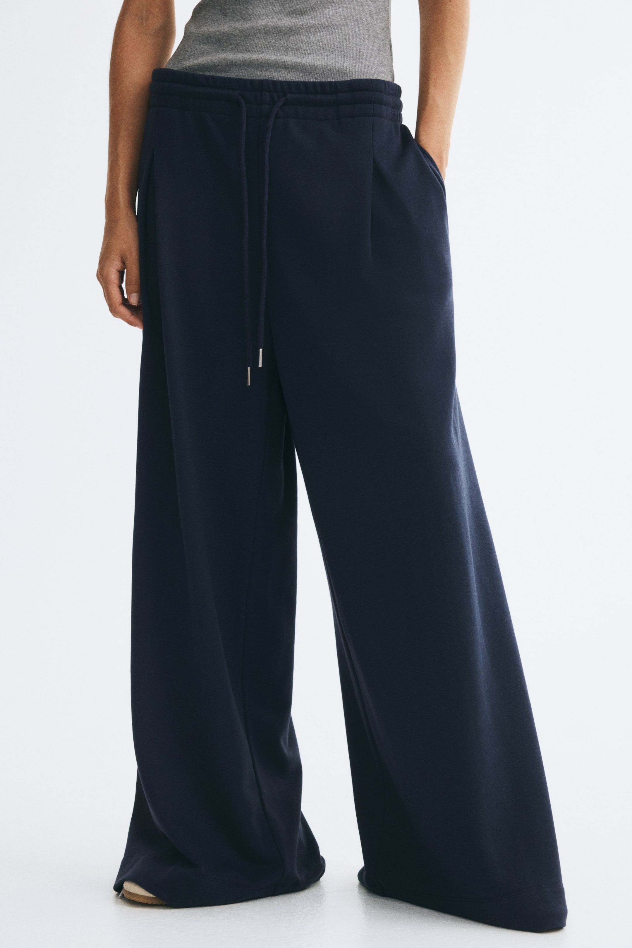Pantalon avec cordon de serrage et plis