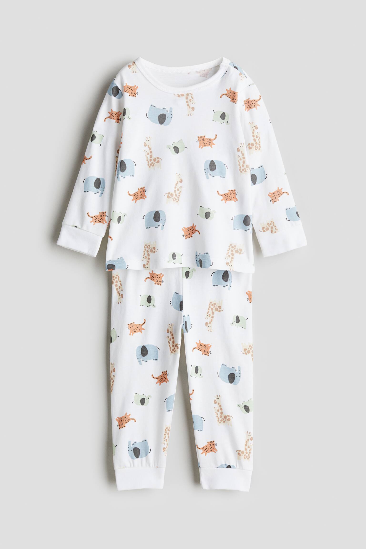 Printed cotton pyjamas - White/Animals/Light pink/Hearts/Light blue/Penguins/White/Cherries/White/Strawberries/Pink/Patterned/White/Vehicles/Light blue/Patterned/Light dusty purple/White/Pandas/White/Hearts - 1