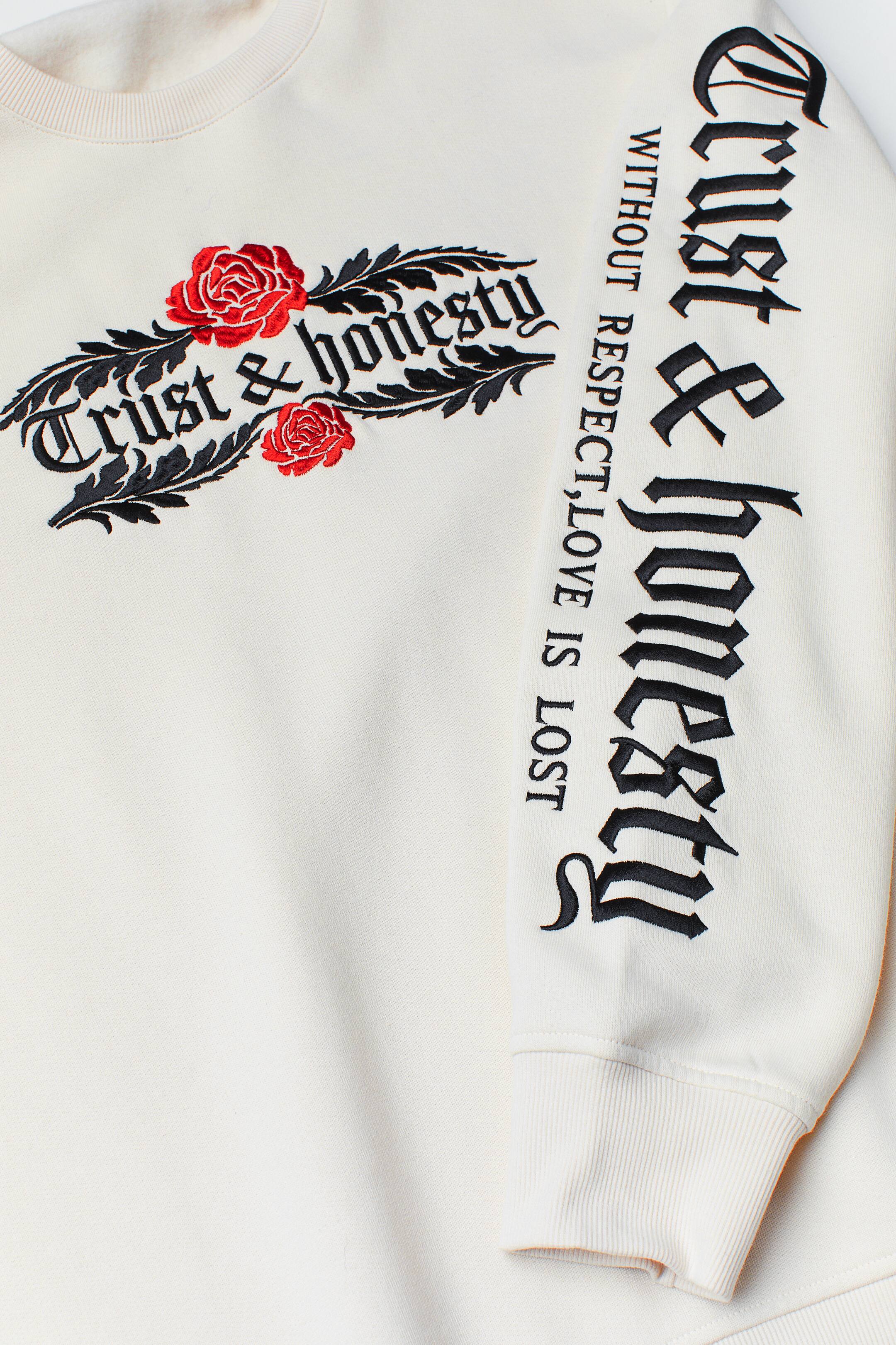 View larger image: Sweatshirt - Light beige/Trust & honesty - Men | H&M HK 2