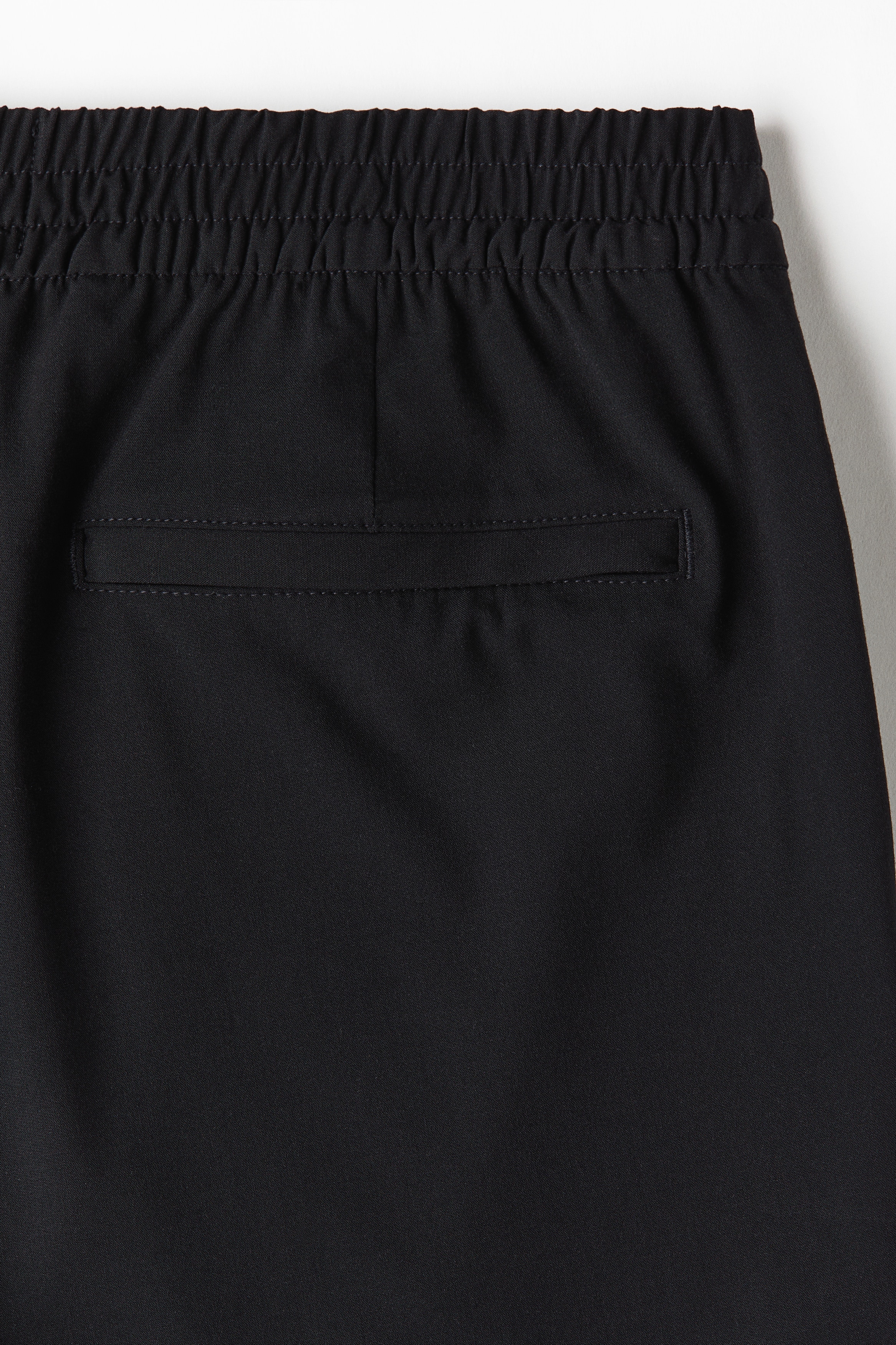 Men's Black Four-Way Stretch Regular-Fit Shorts | H&M CA