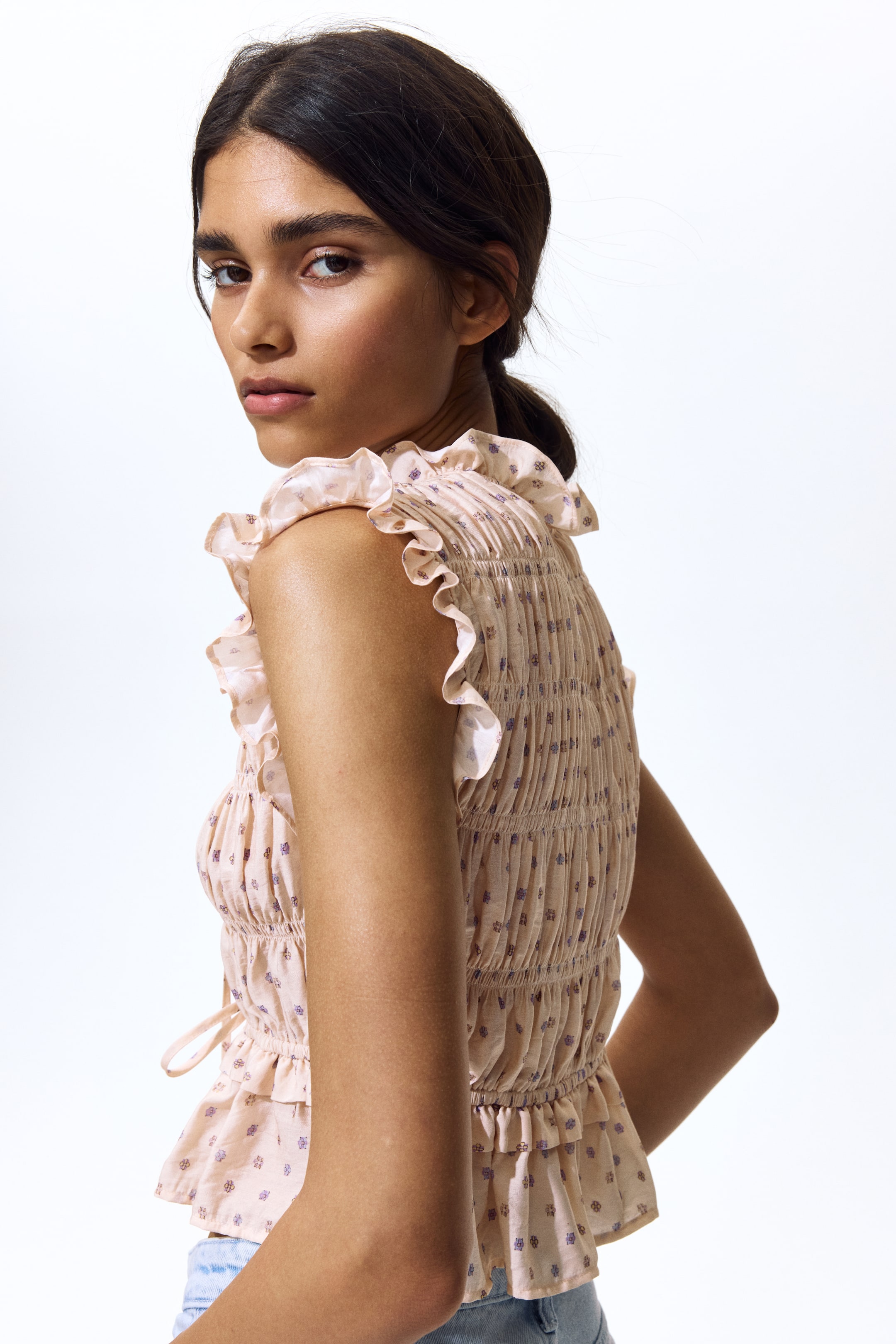 Sleeveless smocked blouse