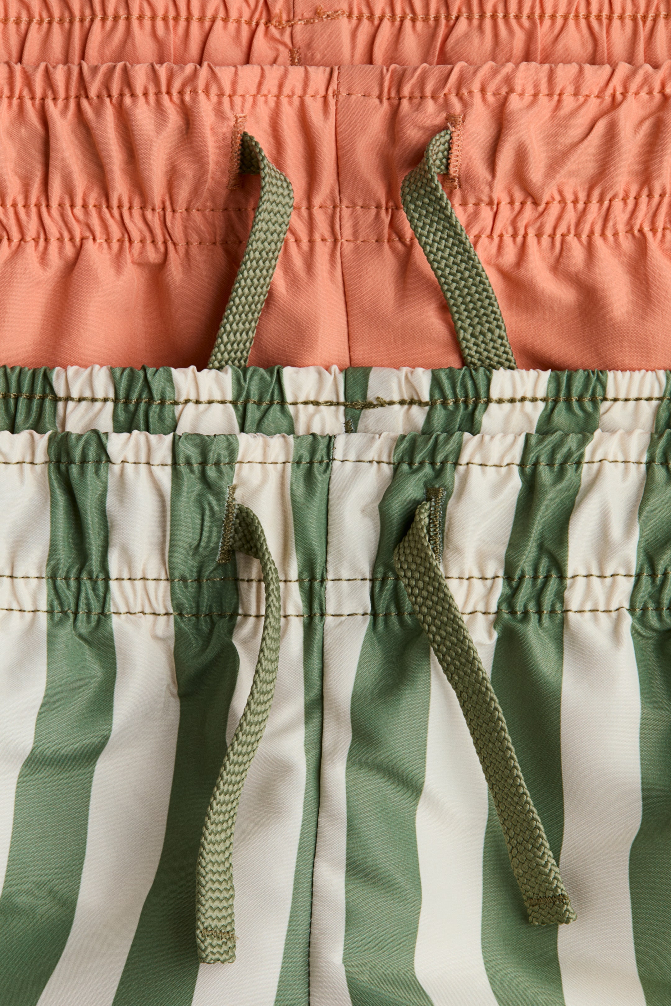View larger image: 2-pack swim shorts - Orange/Green striped - Kids | H&M HK 2