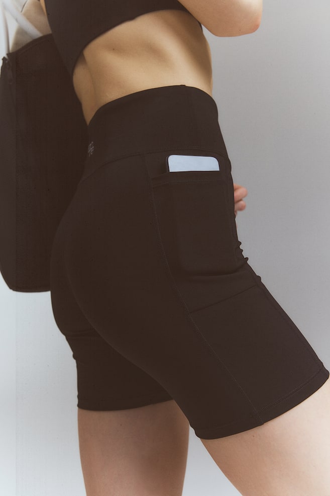 DryMove™ Pocket-detail sports cycling shorts - Black - 3