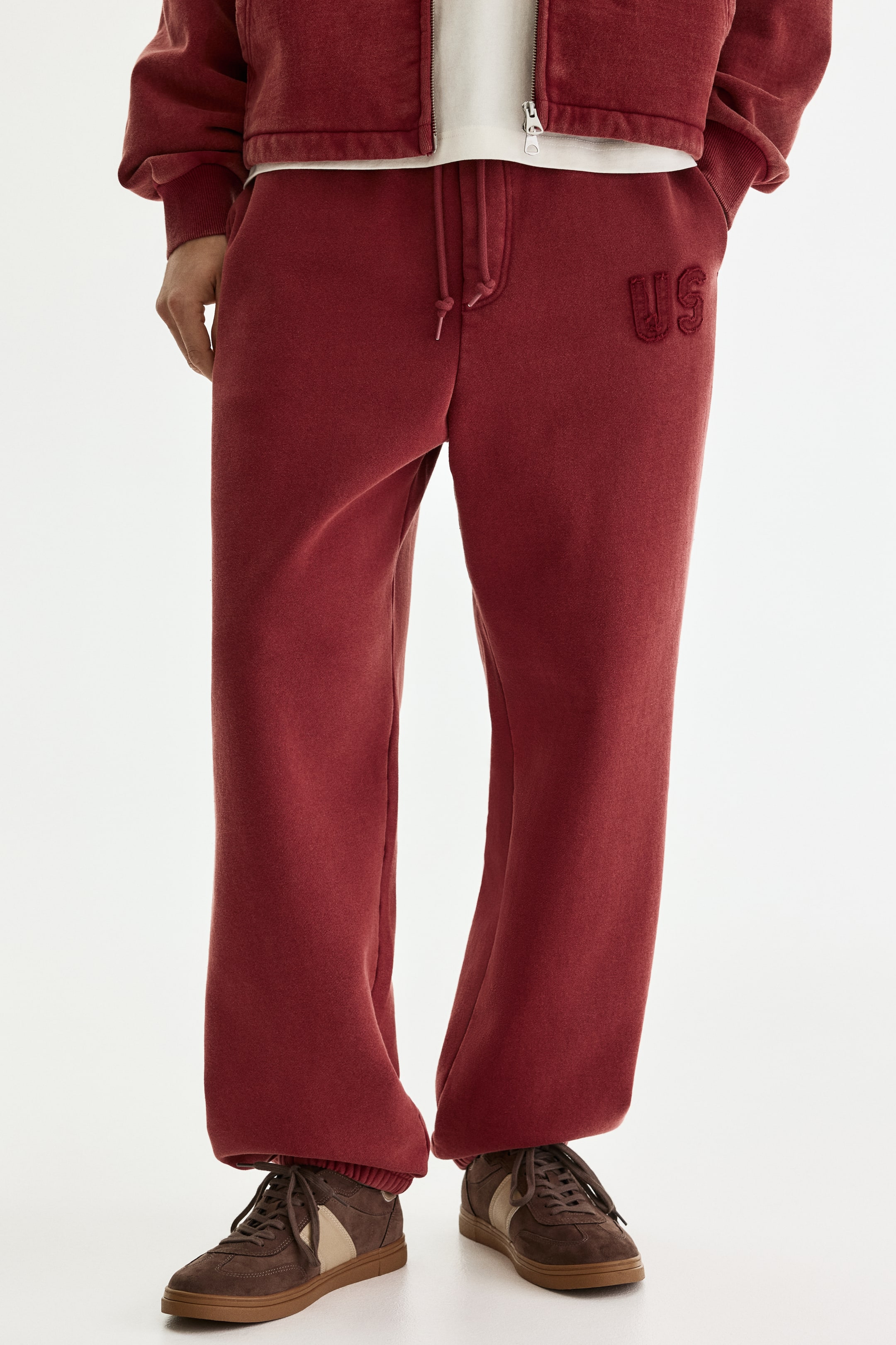 Pantalon en molleton avec patch Compass