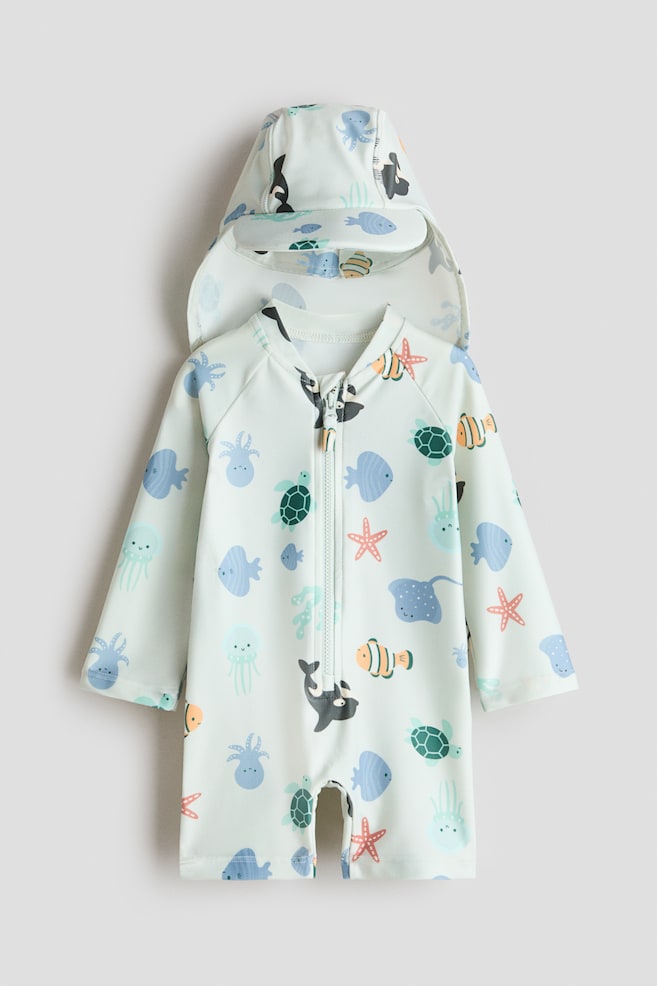 Ensemble de protection solaire UPF 50 - Turquoise clair/animaux marins/Turquoise clair/palmiers/Bleu clair/rayé/Crème/fleuri/Vert clair/léopard/Rose/fleuri/Blanc/animaux marins/Rose clair/cerises/Beige clair/animaux/Bleu clair/motif/Crème/motif - 1