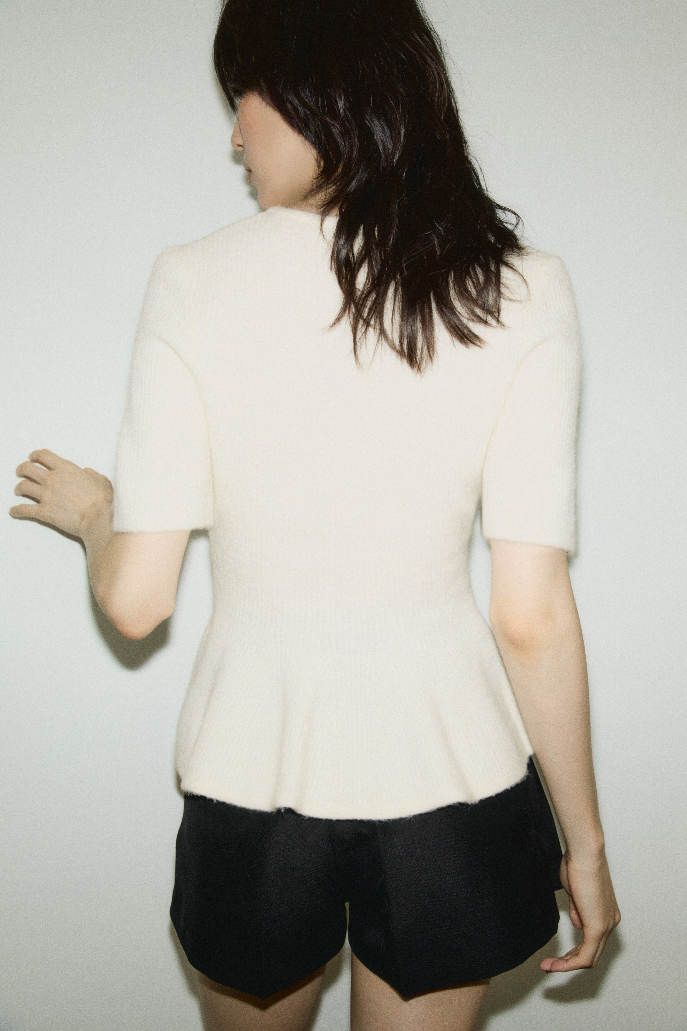 Rib-knit peplum top