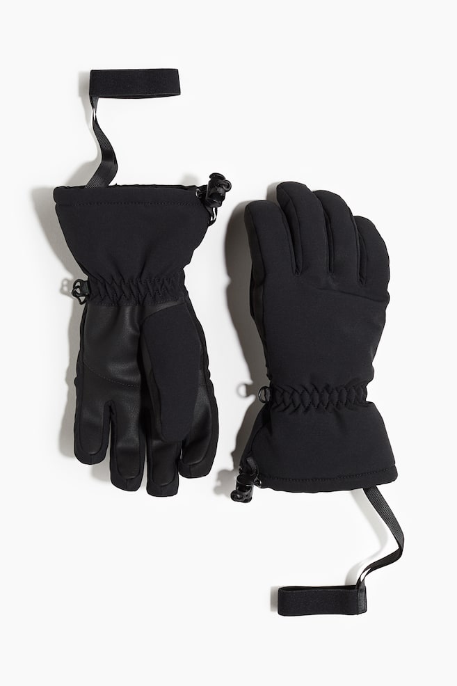 Water-repellent ski gloves with ThermoMove™ - Black - 1