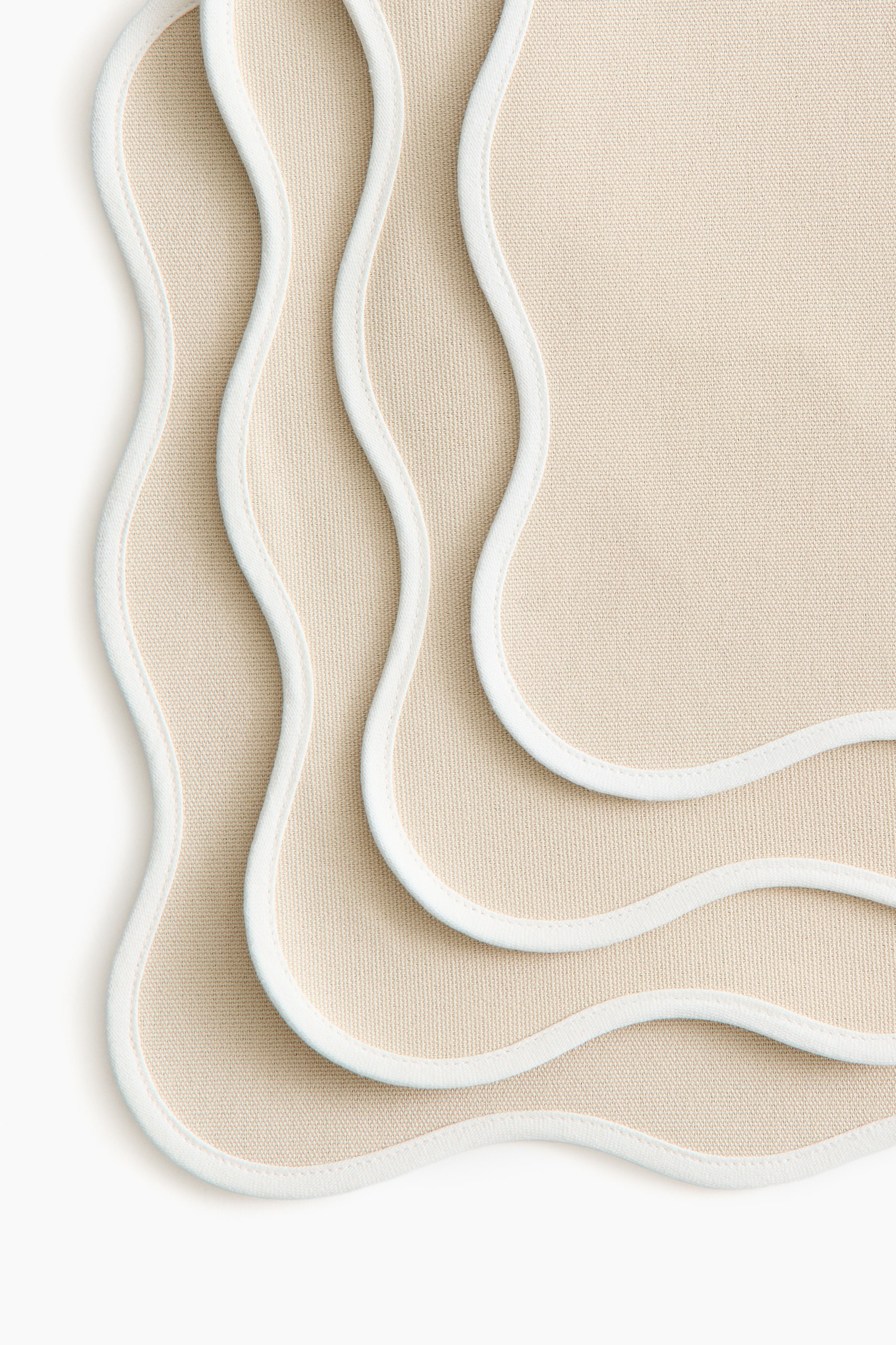 View larger image: 4-pack water-repellent place mats - Light beige/white - Home All | H&M US 2