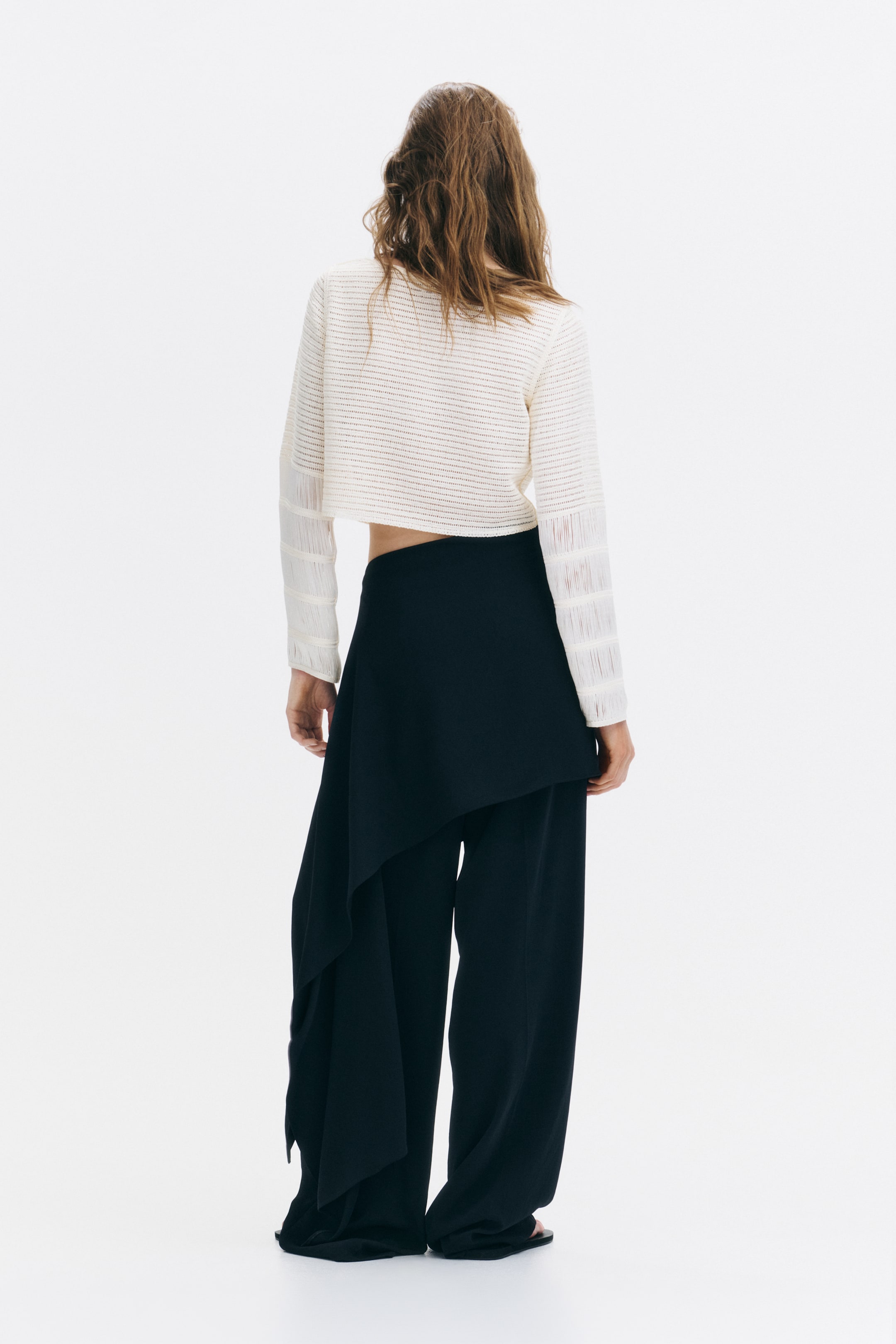 Pantalon chic avec jupe superposée