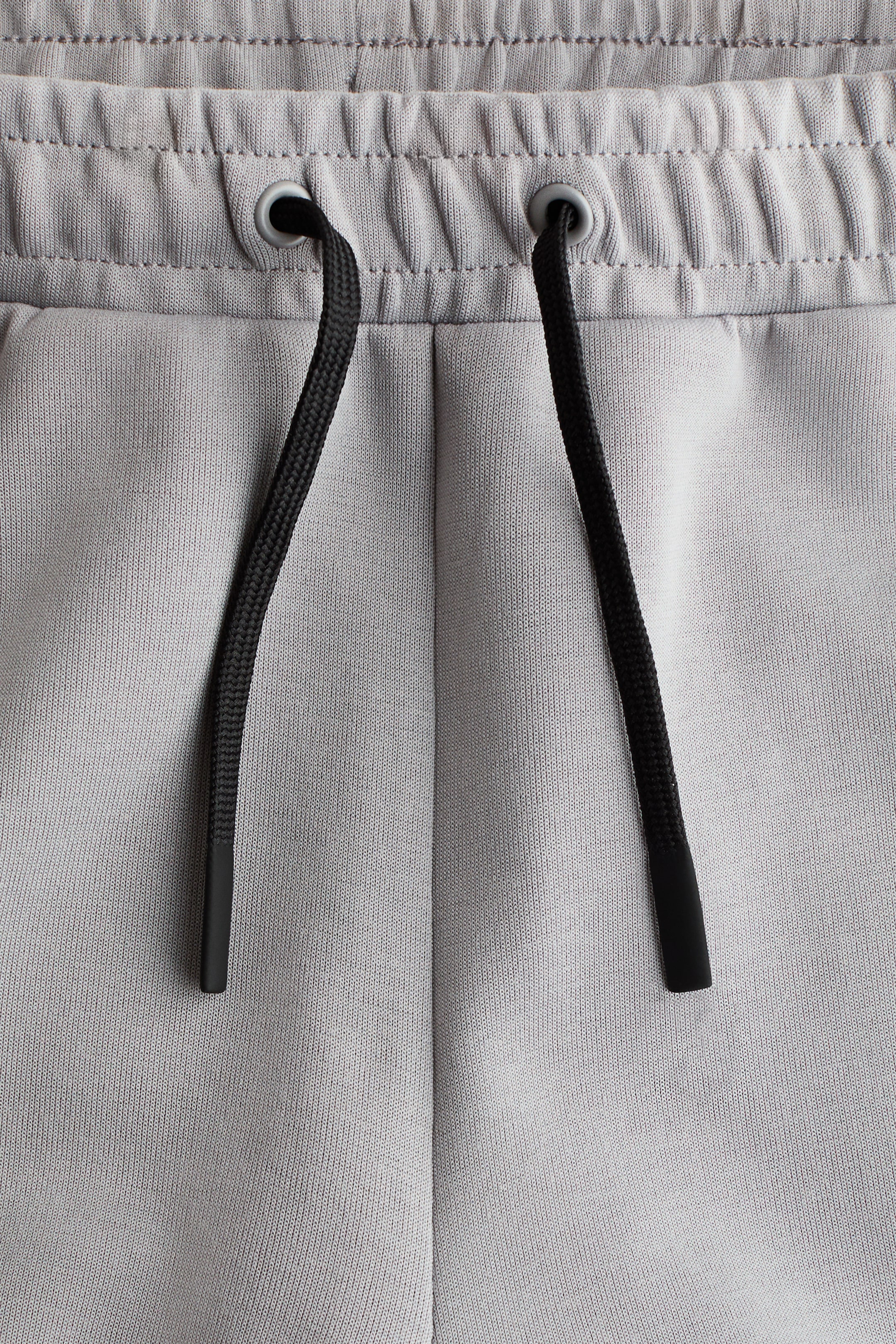 Ampliar la imagen: Relaxed Fit Sports joggers with DryMove™ - Gris claro - Kids | H&M MX 5