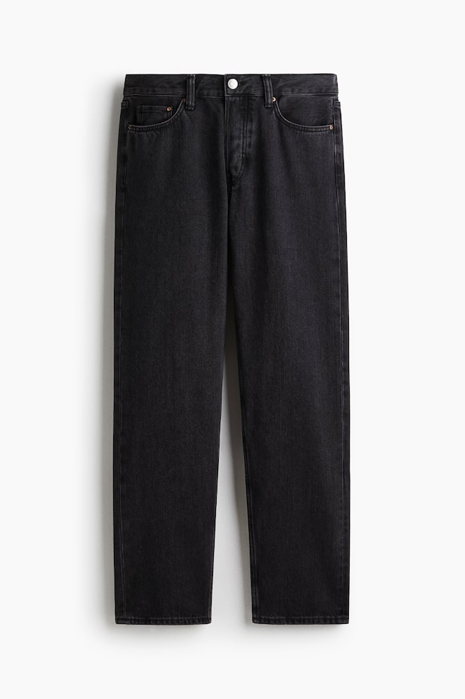 FRONT: Black 5-pocket jeans, crafted from rigid cotton denim, are showcasing a relaxed fit with straight legs. They are featuring a regular waist and a button fly closure. - 1