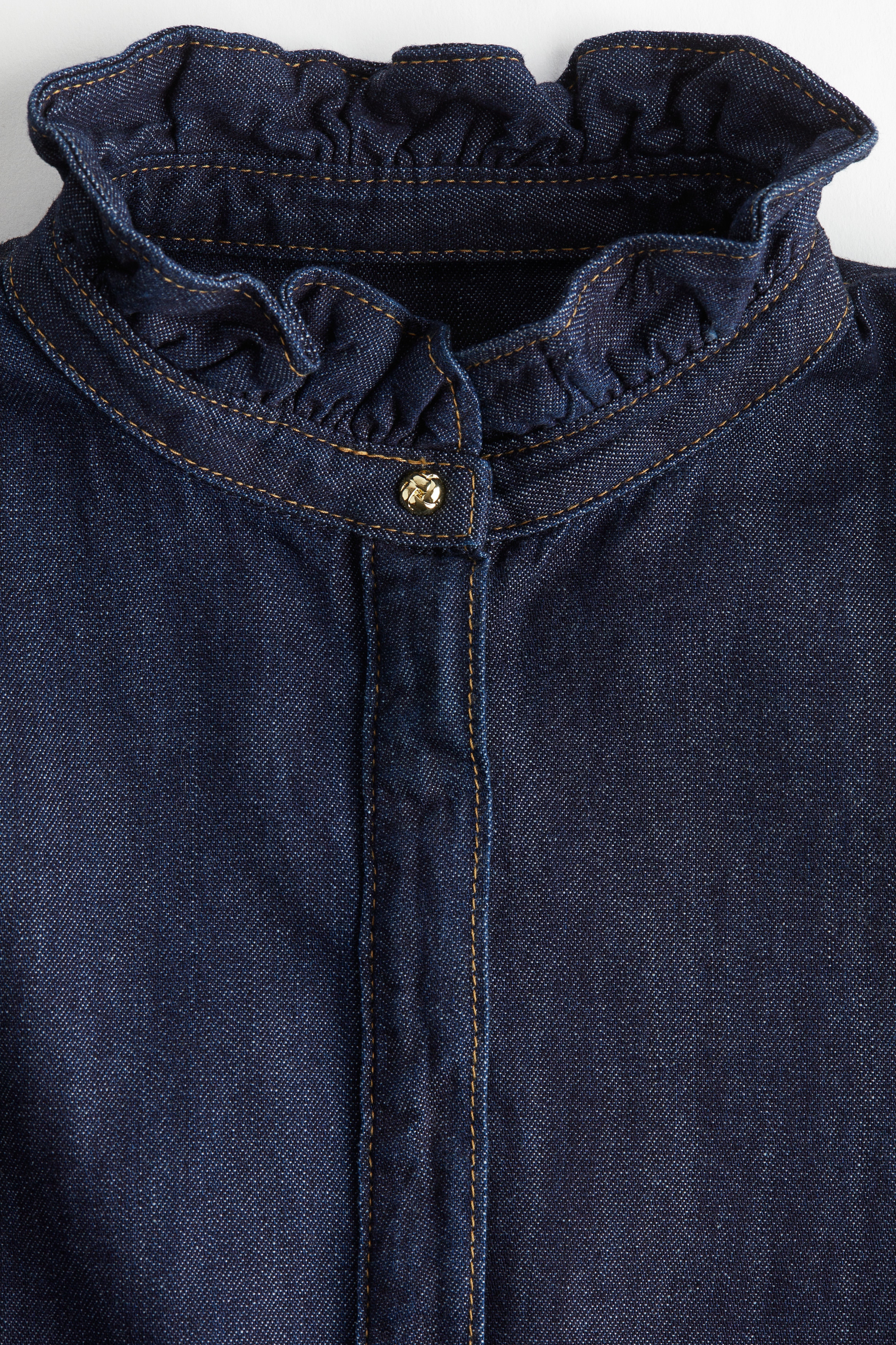 Frill-trimmed denim blouse