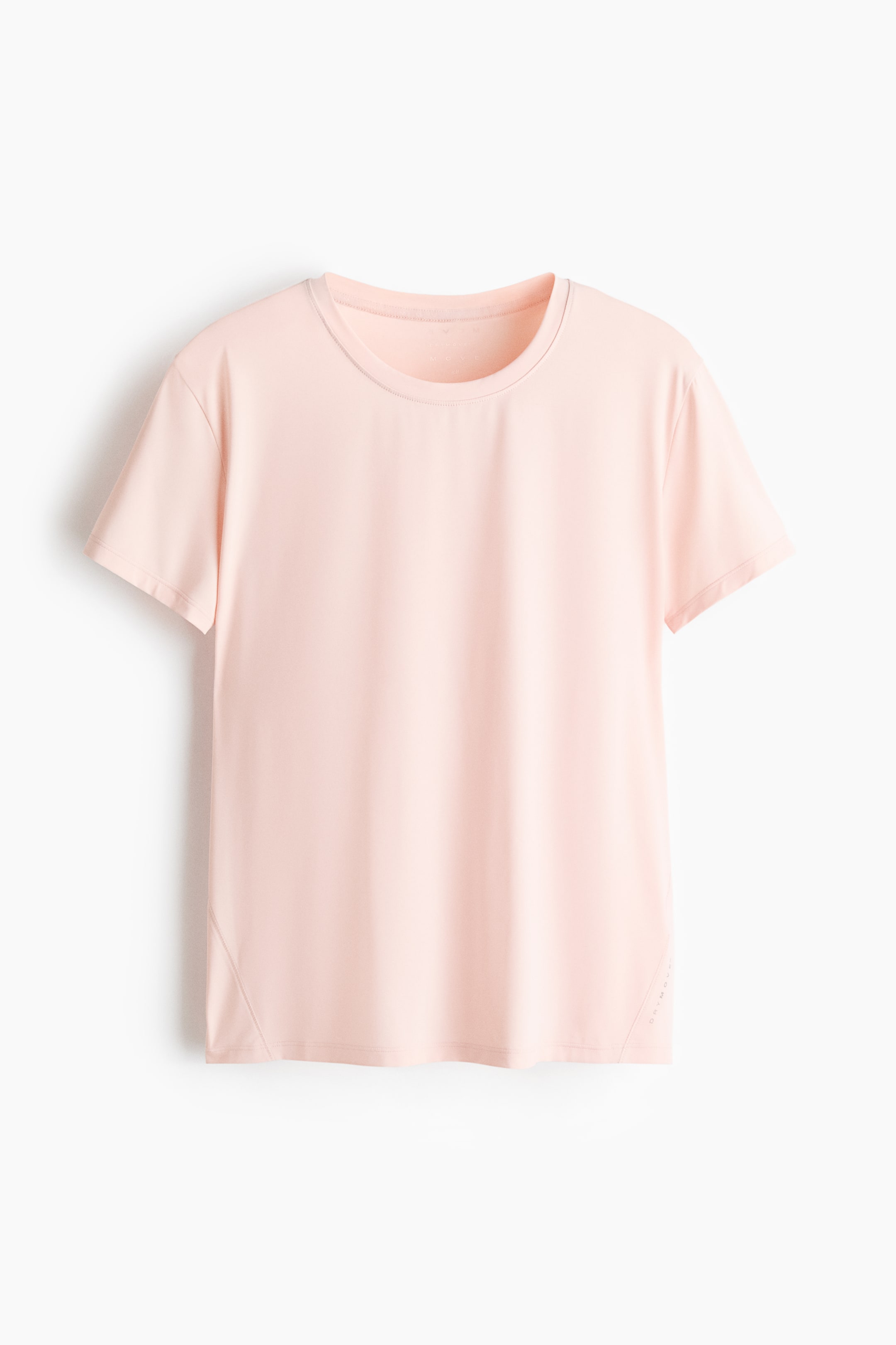 View larger image: A light pink t-shirt is showcased FRONT, featuring a crew neck with visible stitching and short sleeves. It highlights a smooth fabric texture, a straight hem, subtle diagonal side seams, and small, tone-on-tone text on the lower right side.