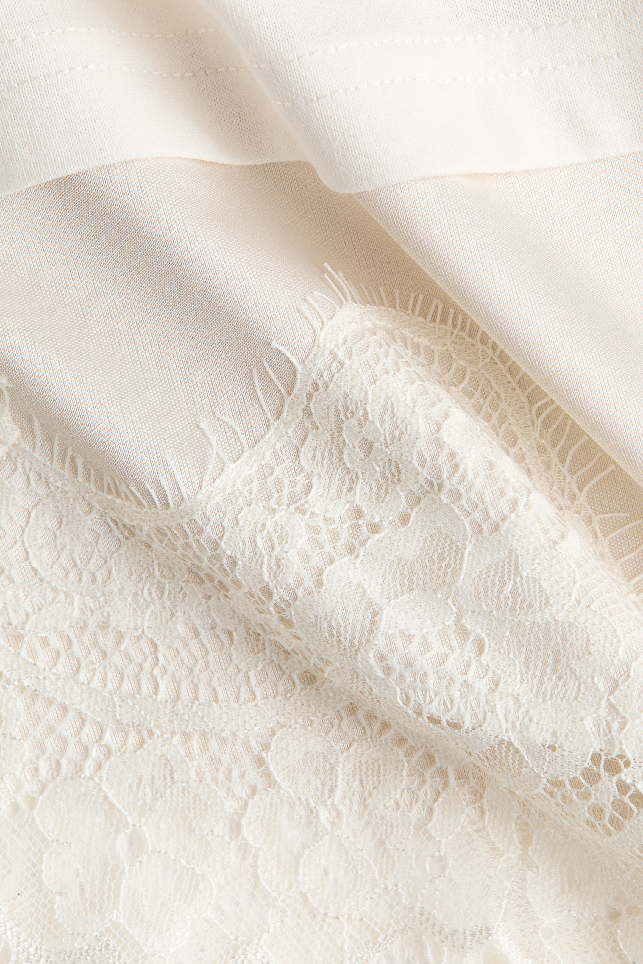 Lace-Trimmed Asymmetric T-Shirt