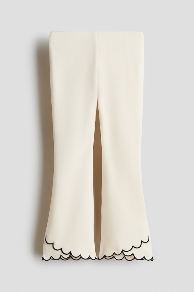 Scalloped-hem flared leggings - Cream/Black - 1