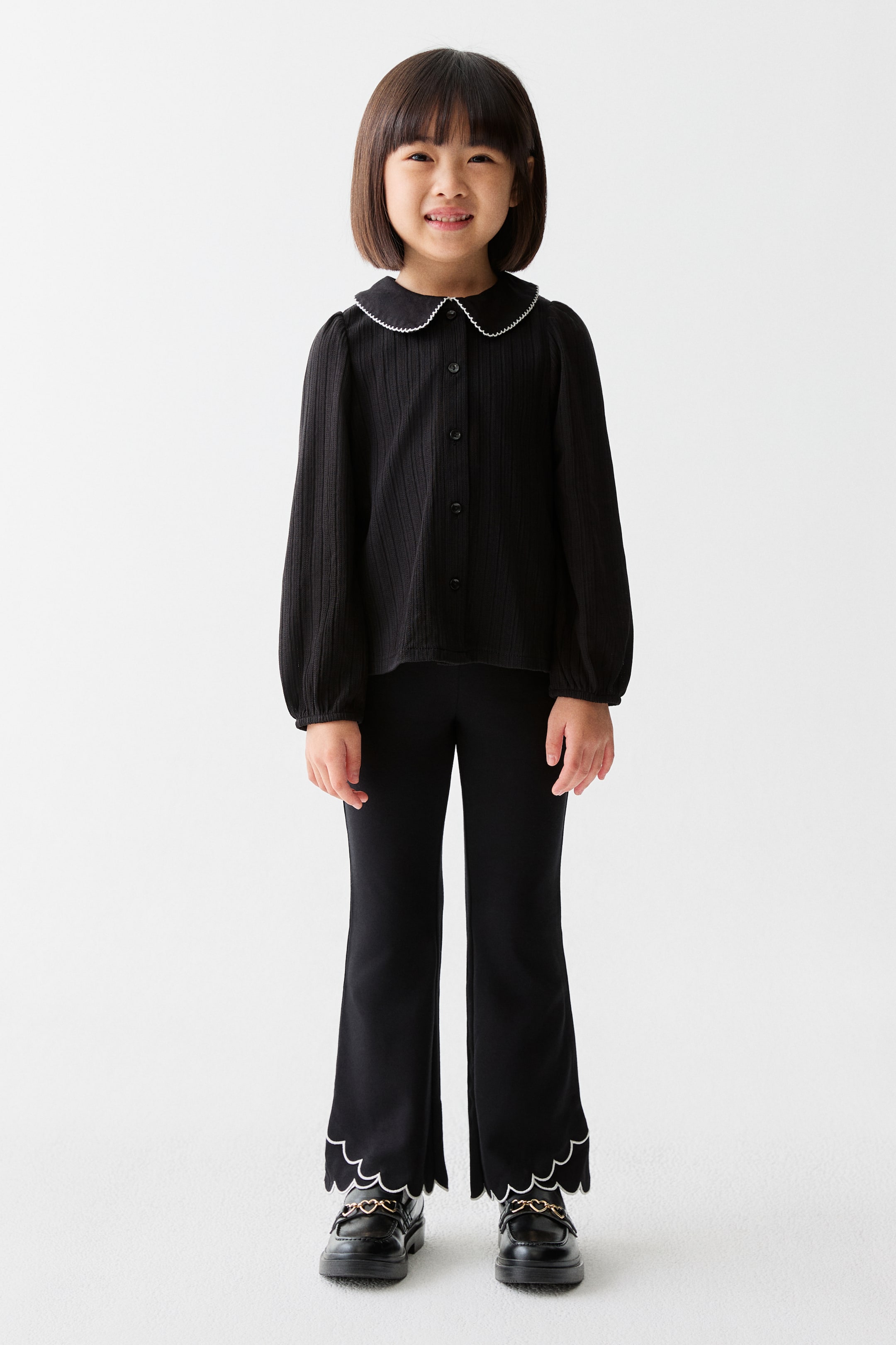 Xem ảnh lớn hơn: Quần legging loe gấu sò điệp - Màu đen - Kids | H&M VN 1