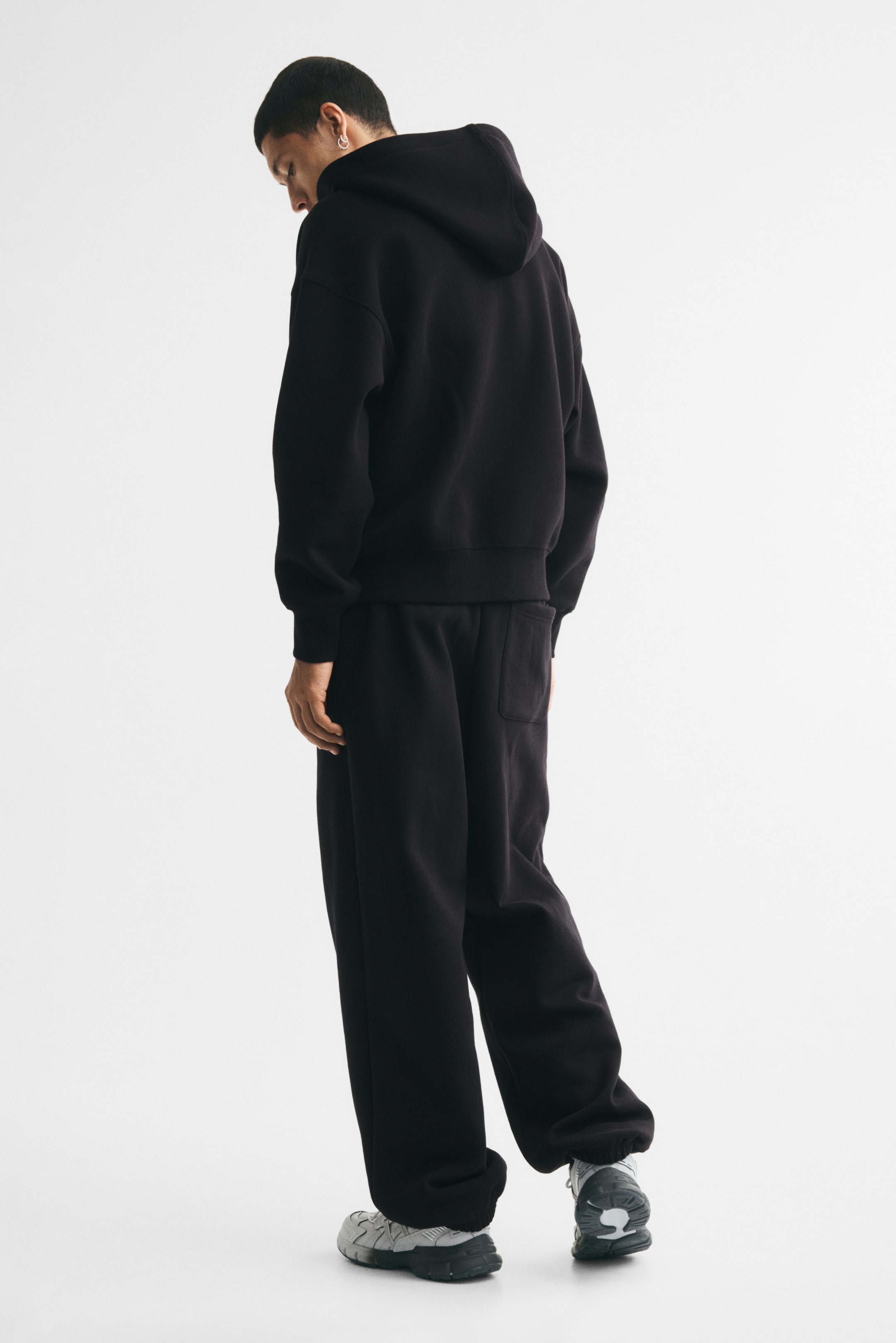 Veste imprimée ample à capuche et fermeture éclair