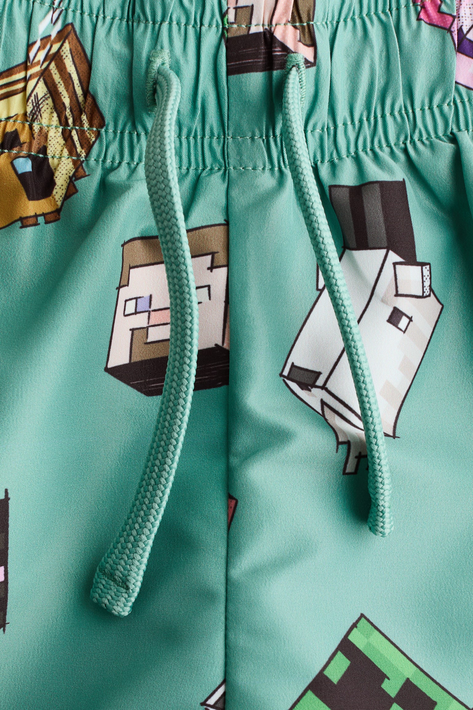 Short de bain imprimé - Vert/Minecraft/Bleu marine/Pokémon/Jaune/Minions/Bleu clair/Lilo et Stitch/Bleu clair/Bluey/Rouge/Cars/Vert clair/Spidey/Gris foncé/Marvel Comics - 2