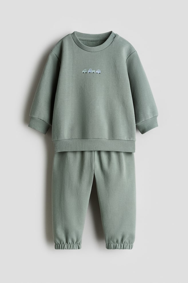 2-piece Sweatsuit - Dusty green/cars/Purple/heart/Light blue/dinosaurs/Dark gray/dinosaurs/Light pink/flower - 1