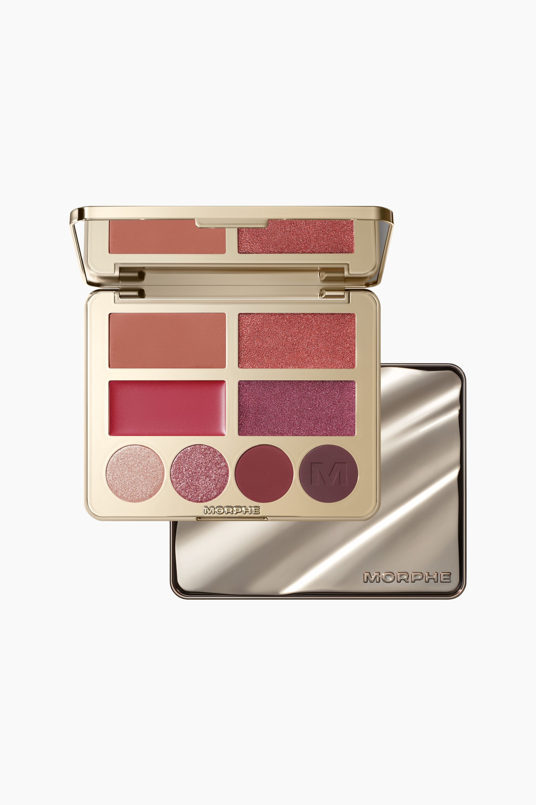 Visa större bild: En öppen Morphe Glass Half Full Face & Eye Palette i guldfärg visar fyra rektangulära ansiktsfärger i terrakotta- och bärtone ovanför fyra runda ögonskuggepanor i matta och skimrande finishar. Den öppna dosan vilar ovanpå ett stängt, metalliskt guldfodral som visar en vågig, reflekterande textur.