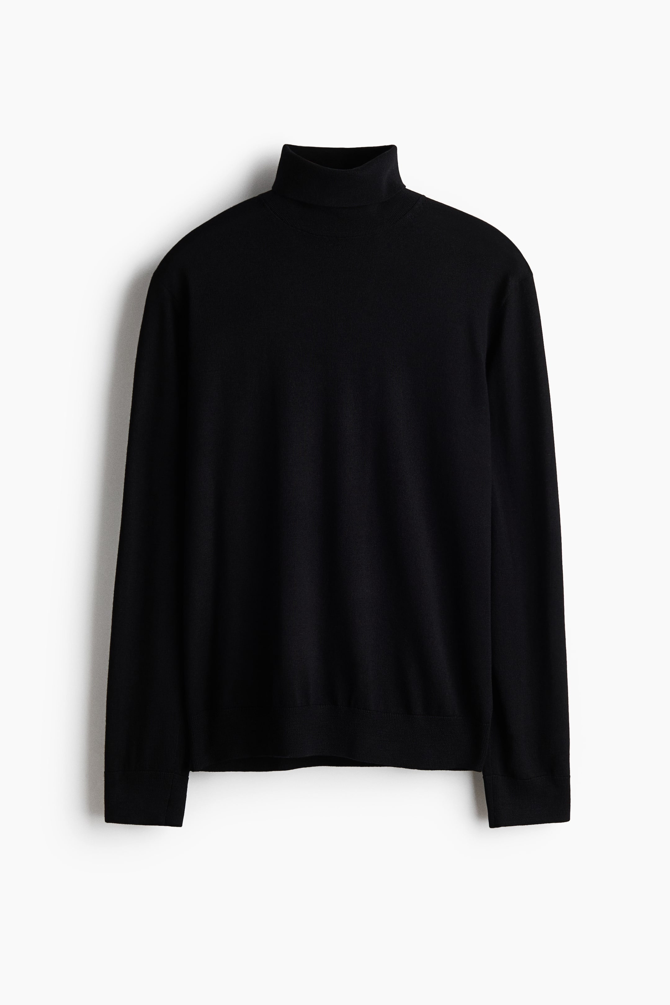 View larger image: A black polo neck jumper is showcasing its front. It features a ribbed polo neck, long sleeves, and ribbed cuffs and hem.