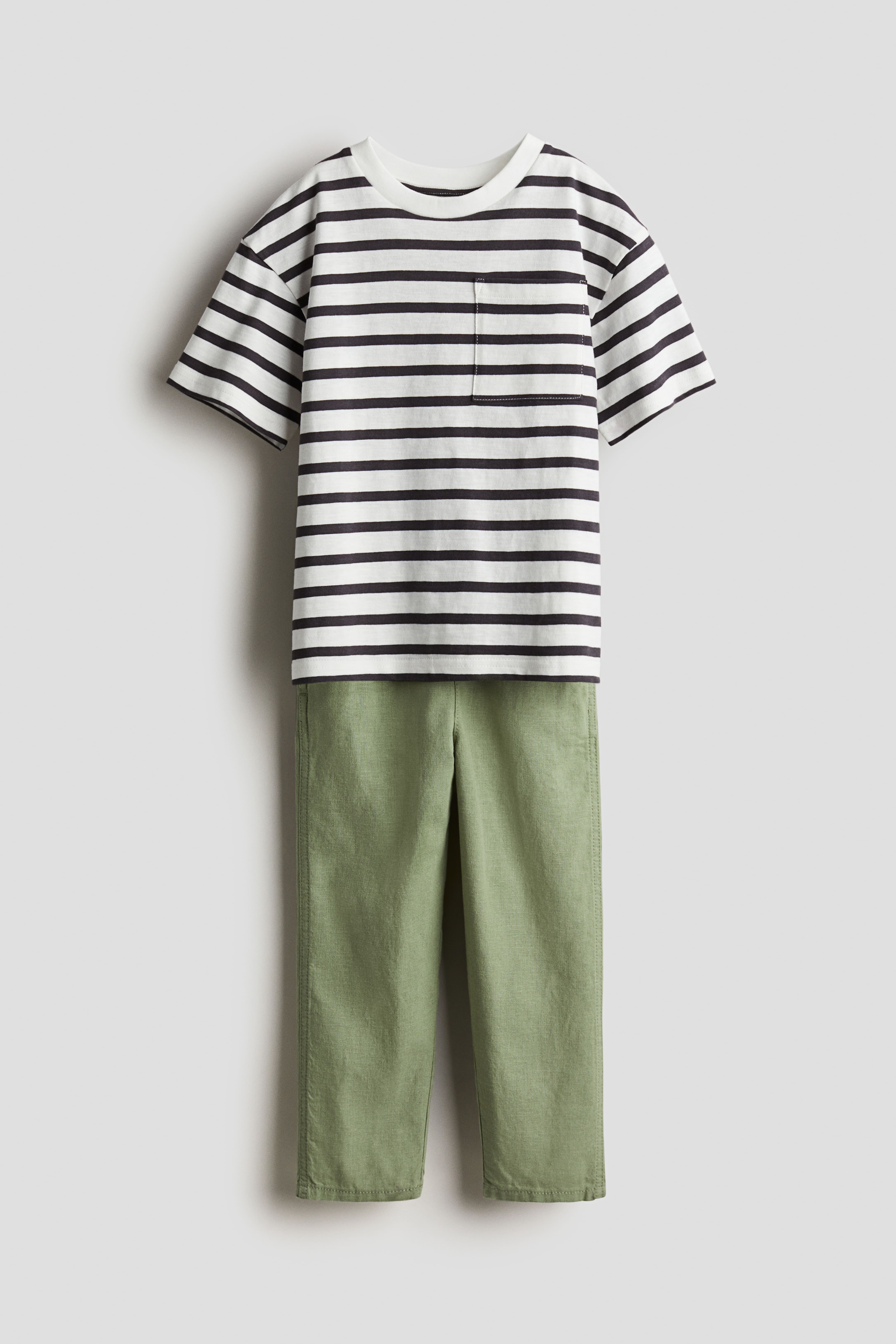 H&m green striped trousers online