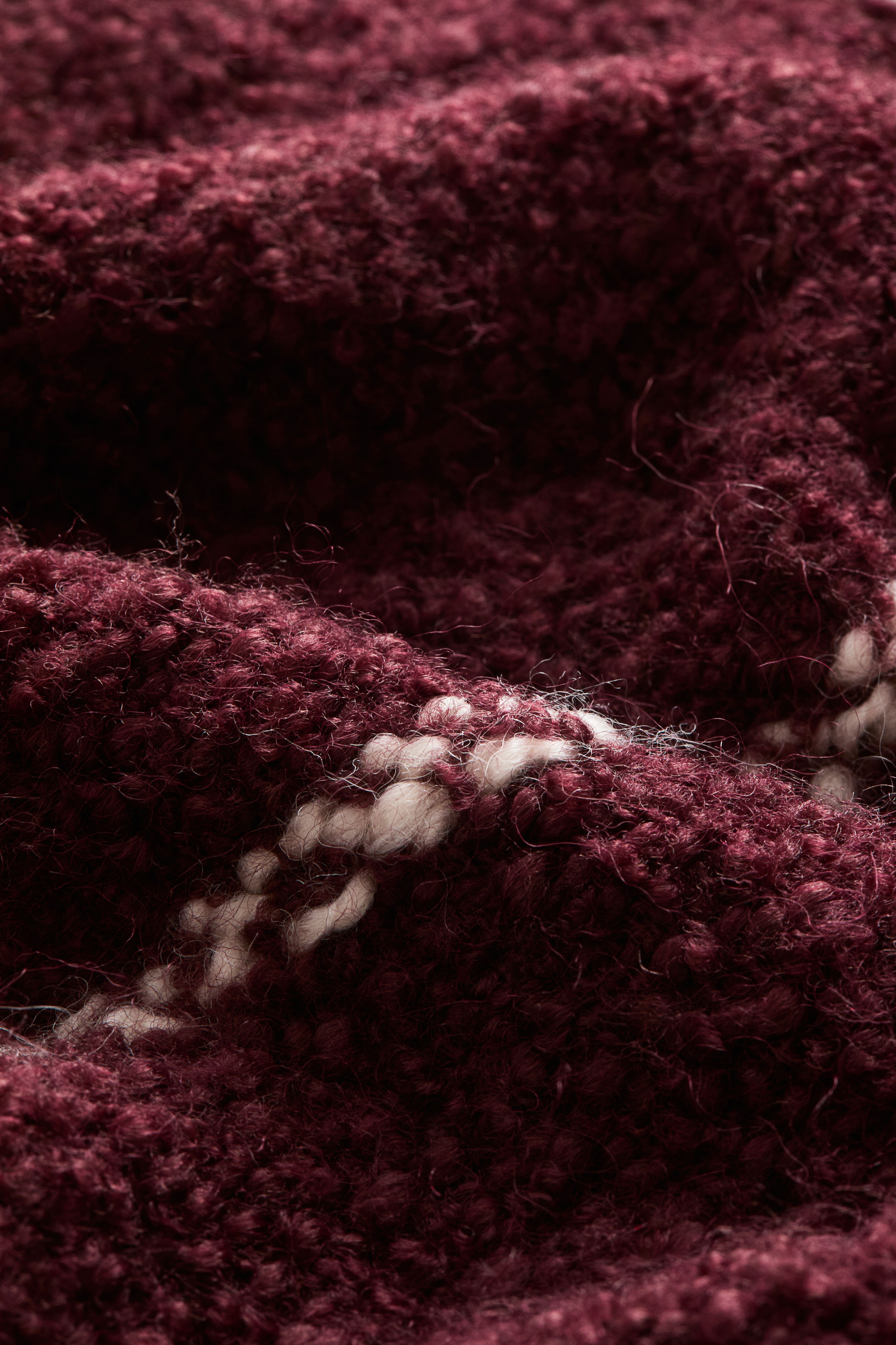 Housse de coussin en laine bouclée mélangée