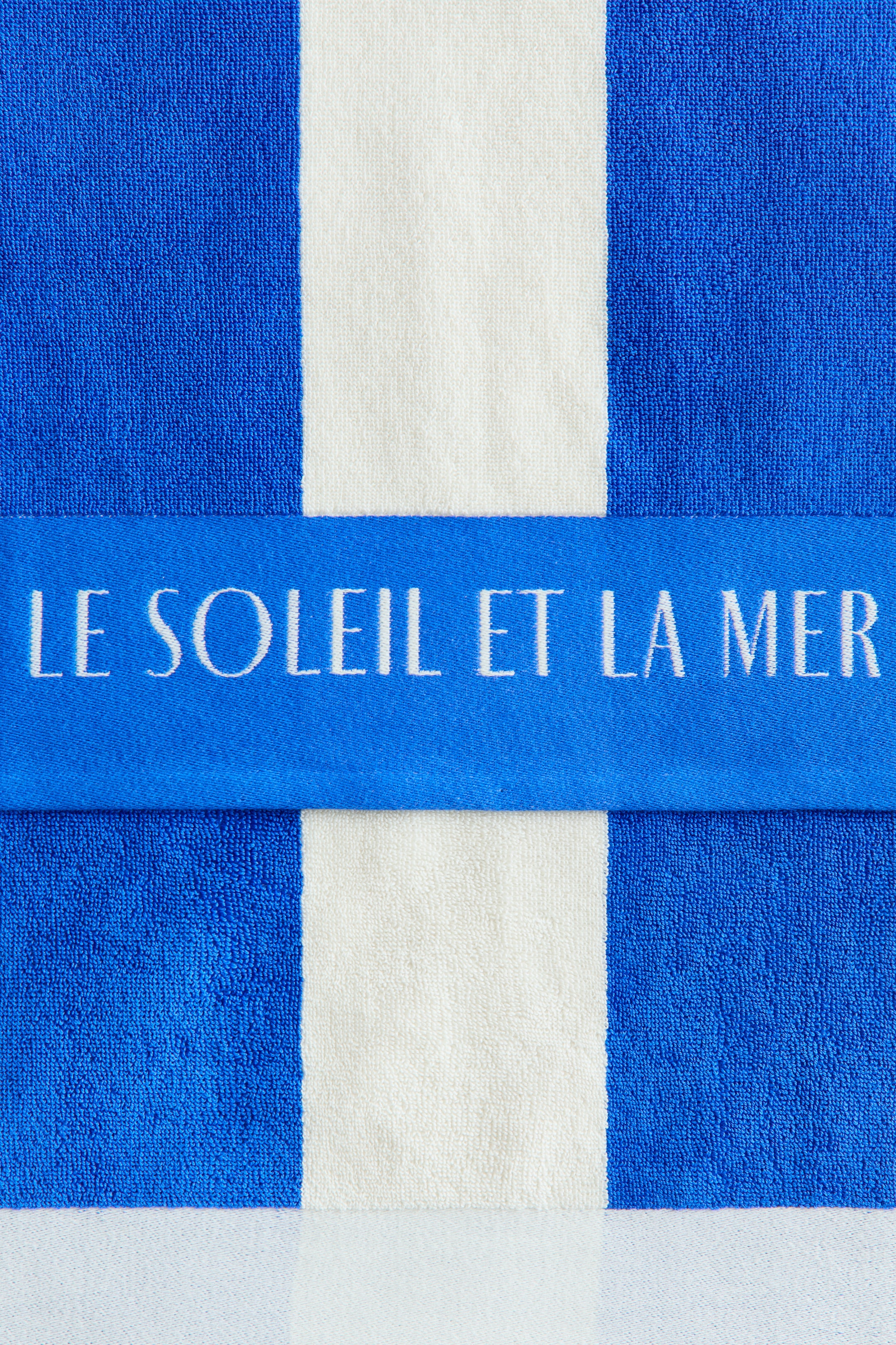 Serviette de plage rayée en coton
