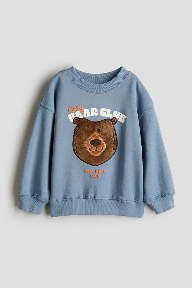 Printed crew-neck sweatshirt - Blue/Cosy Bear Club/Light green/horses/Black/Sports Dept./Light gray melange/Paris/Green/SOHO - 1