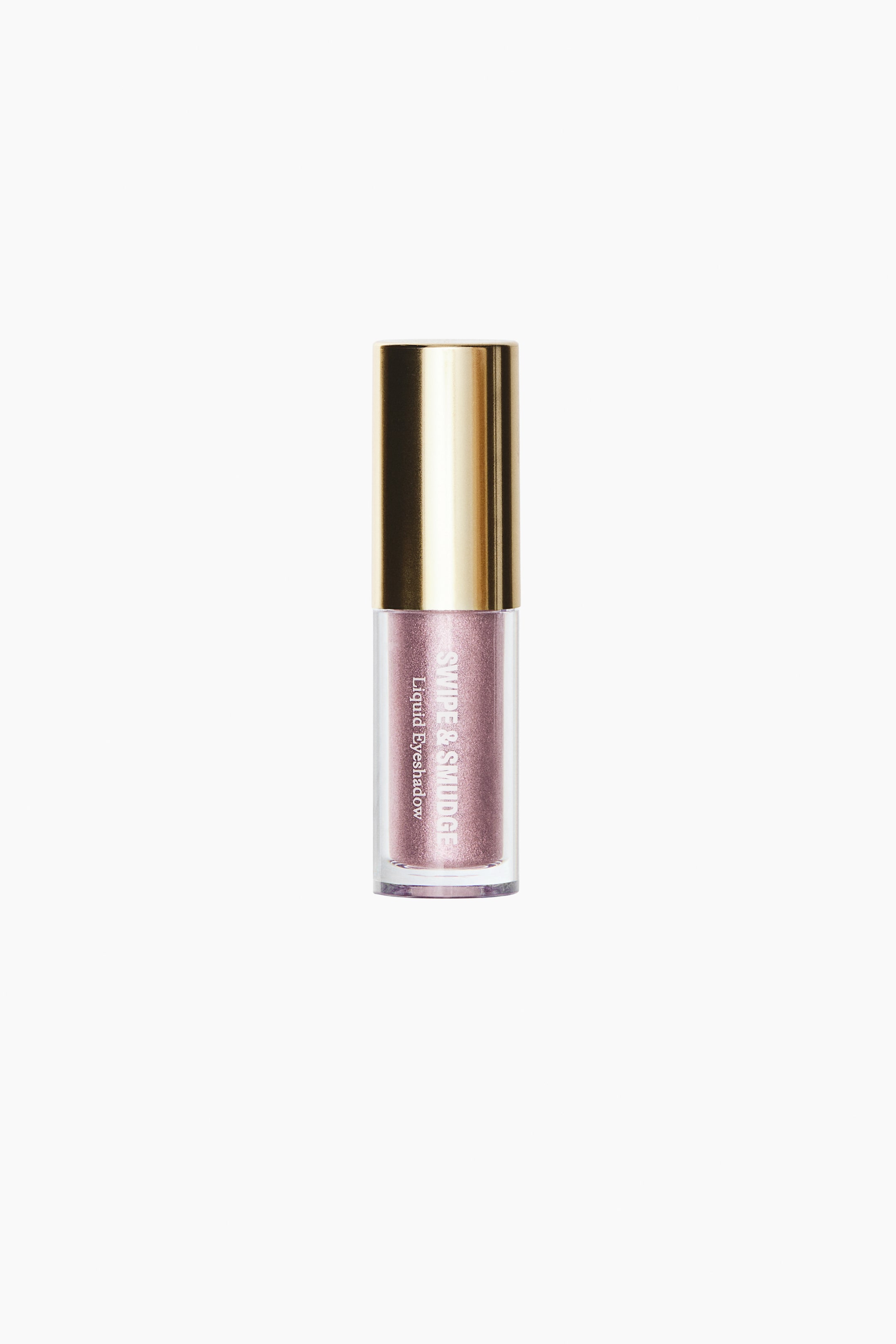 View larger image: A tube of liquid eyeshadow stands upright, showcasing a shimmering pink formula through its clear cylindrical vial. The product is facing forward, featuring a metallic gold cap and white text that reads "SWIPE & SMUDGE Liquid Eyeshadow" printed vertically on the container.