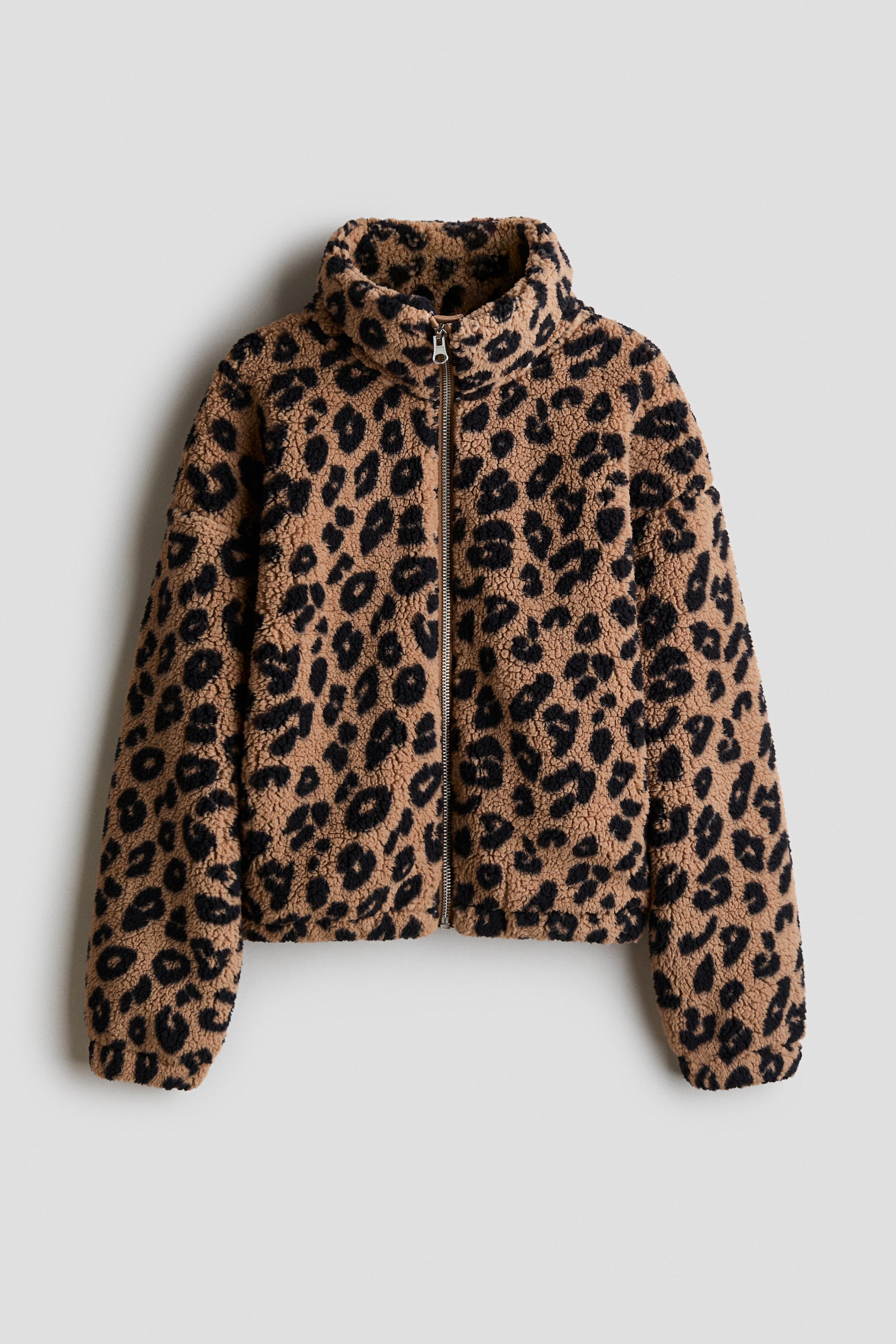 View larger image: A leopard-print fleece jacket is shown with a high stand-up collar and a full front zipper, presented from the front.