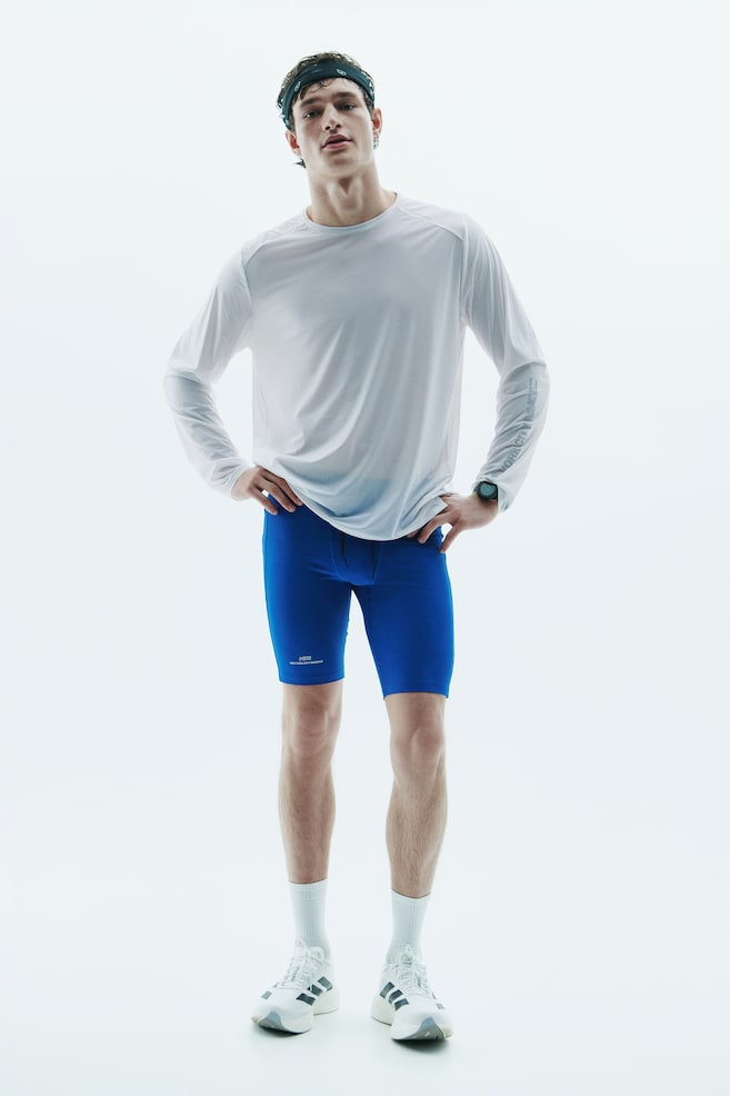 Langärmliges Laufshirt mit CoolMove™ - Weiß/NYC/Weiß/Dunkelgrau/Schokoladiges Pflaumenlila - 1