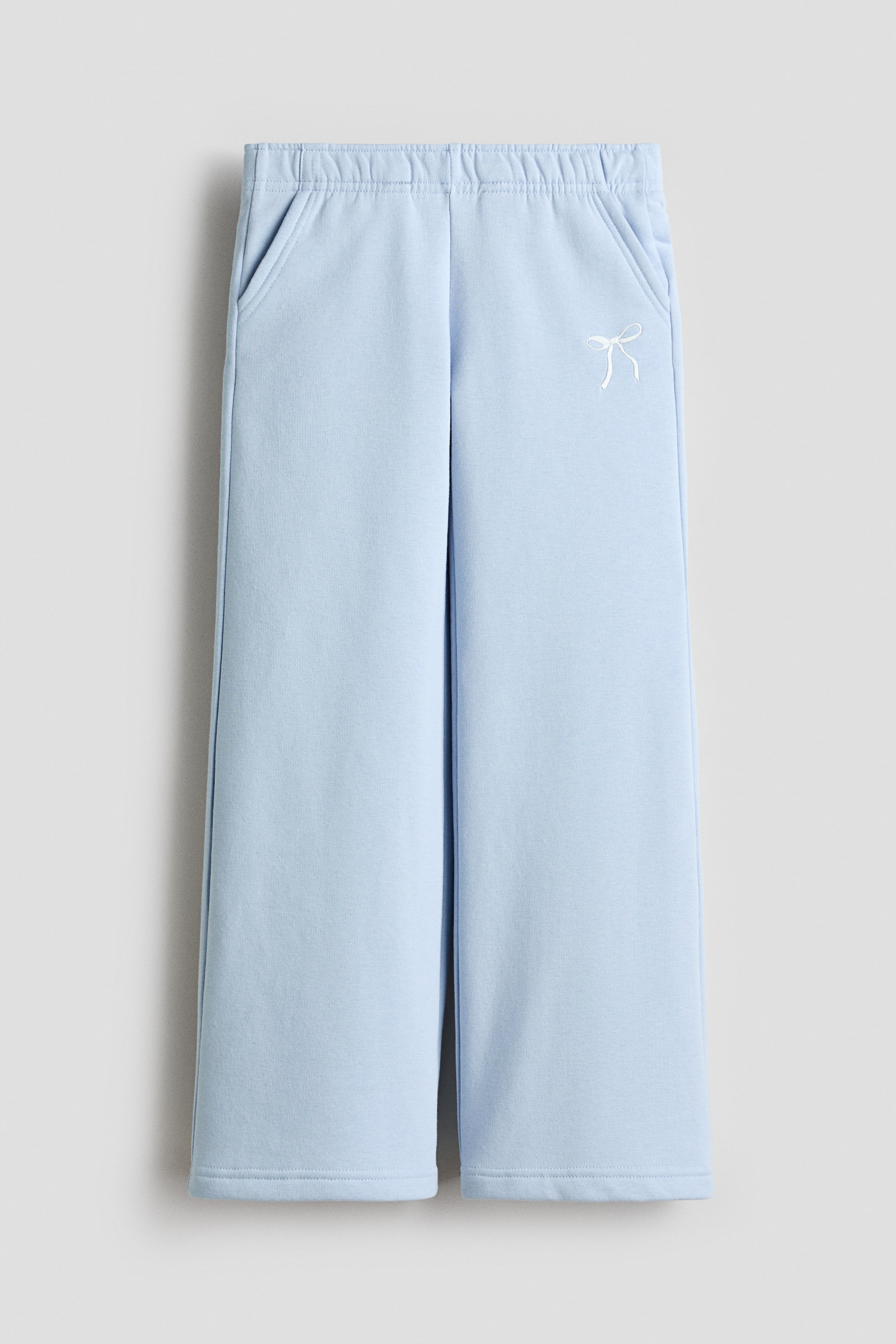 Ingrandisci l'immagine: Joggers in felpa a gamba dritta - Azzurro/fiocco - BAMBINO | H&M CH 1