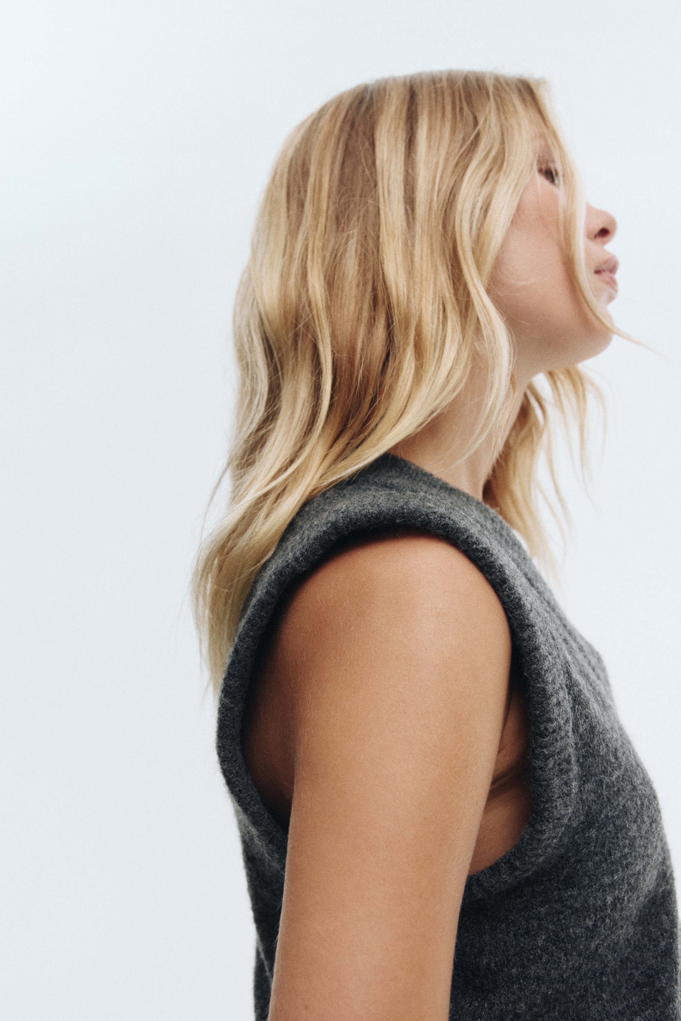 Short sweater vest