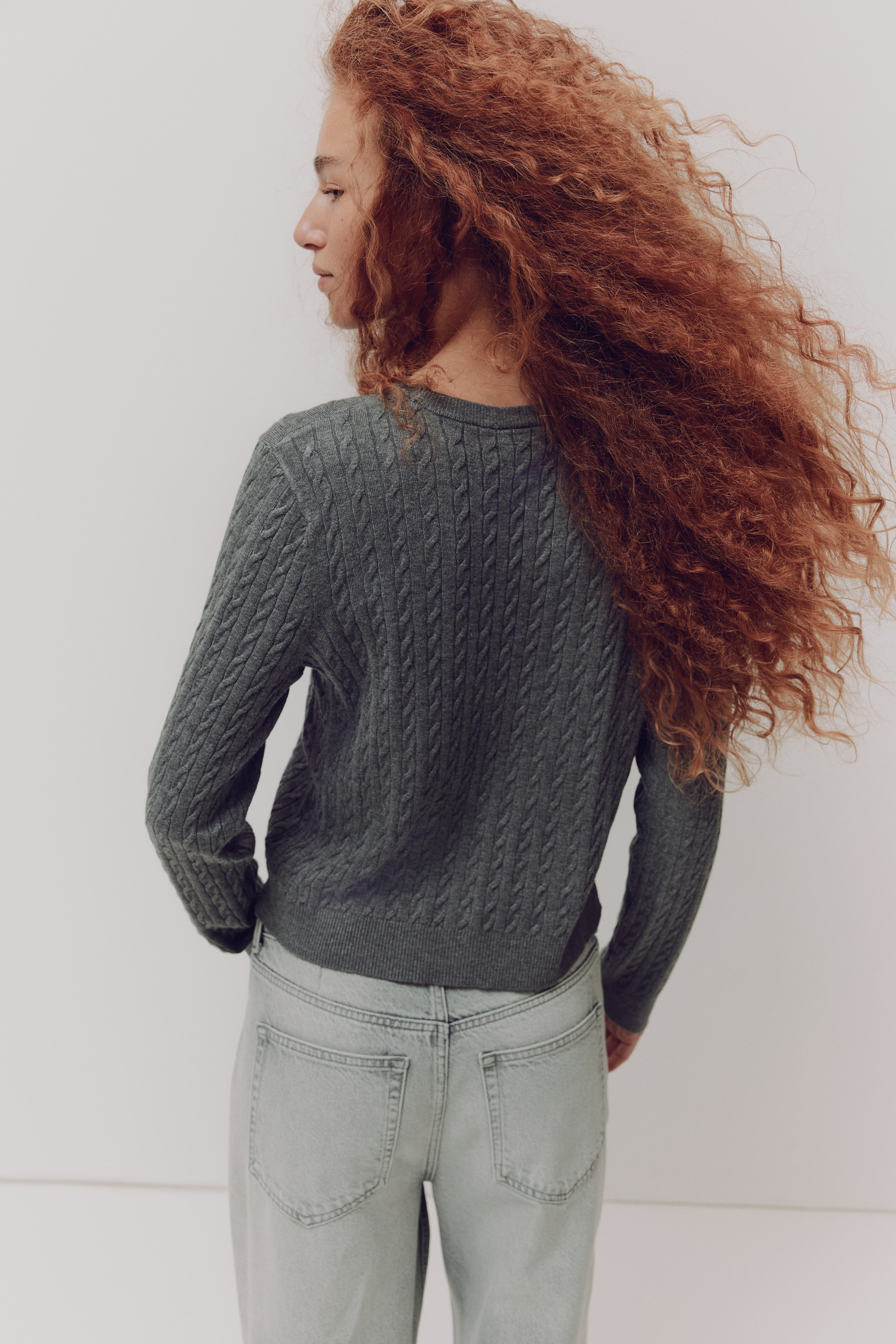 Cable-knit jumper