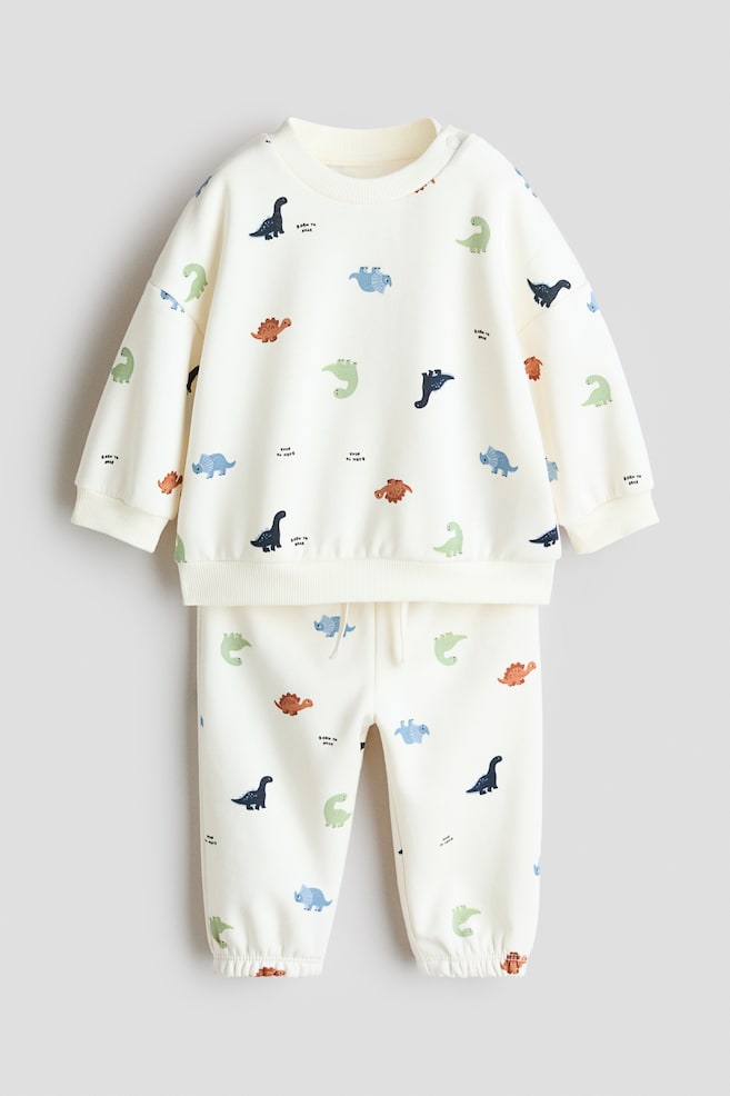 2-Piece Printed Sweatshirt and Joggers Set - White/dinosaurs/Beige/animals/Dark gray/Always Funday/Light gray/Oxford/Light green/vehicles/Cream/vehicles/Navy blue/New York - 1