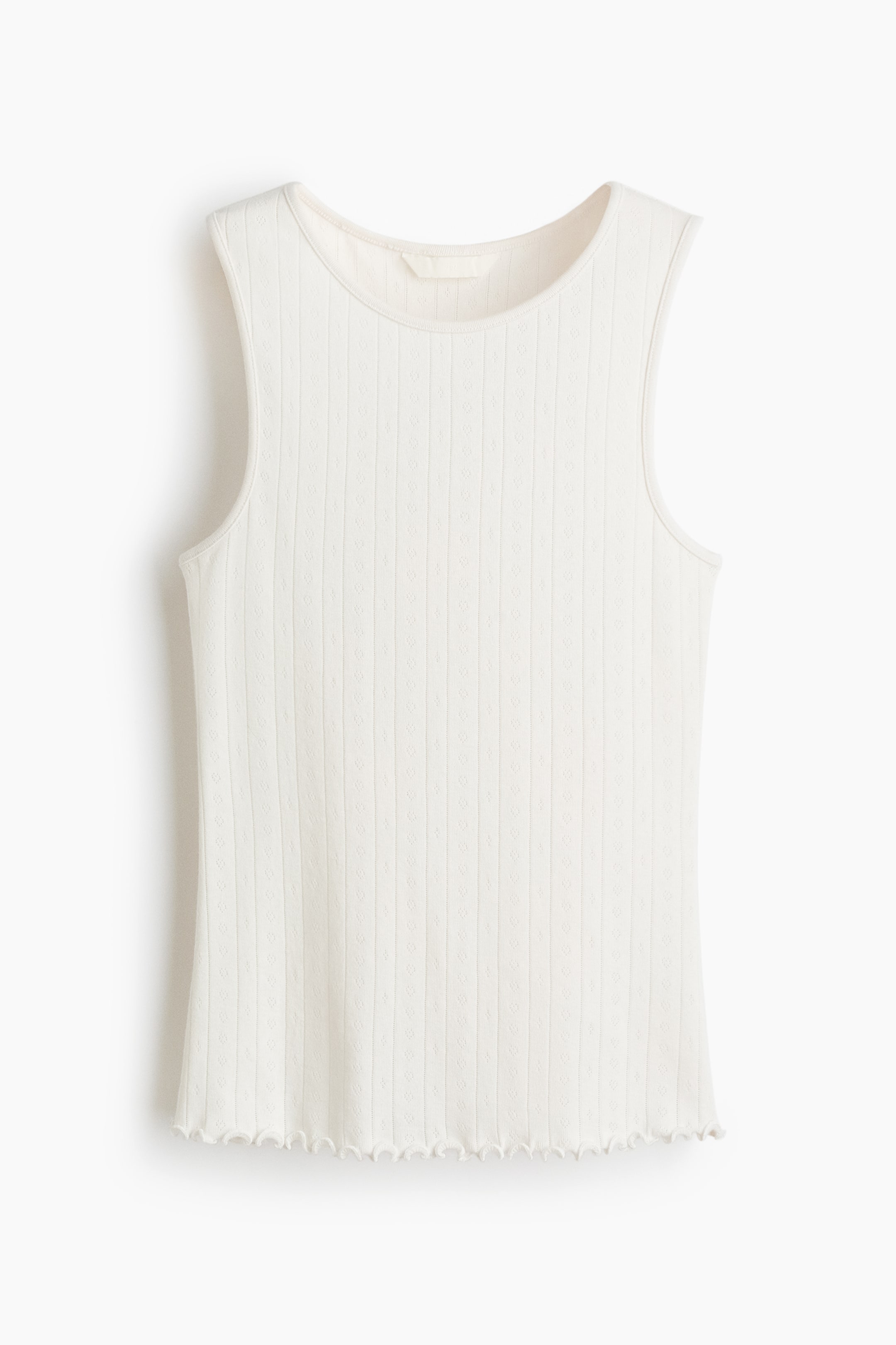 View larger image: A cream sleeveless tank top is displaying its FRONT, featuring a ribbed knit with a subtle diamond pattern, a crew neck, and a scalloped bottom hem.