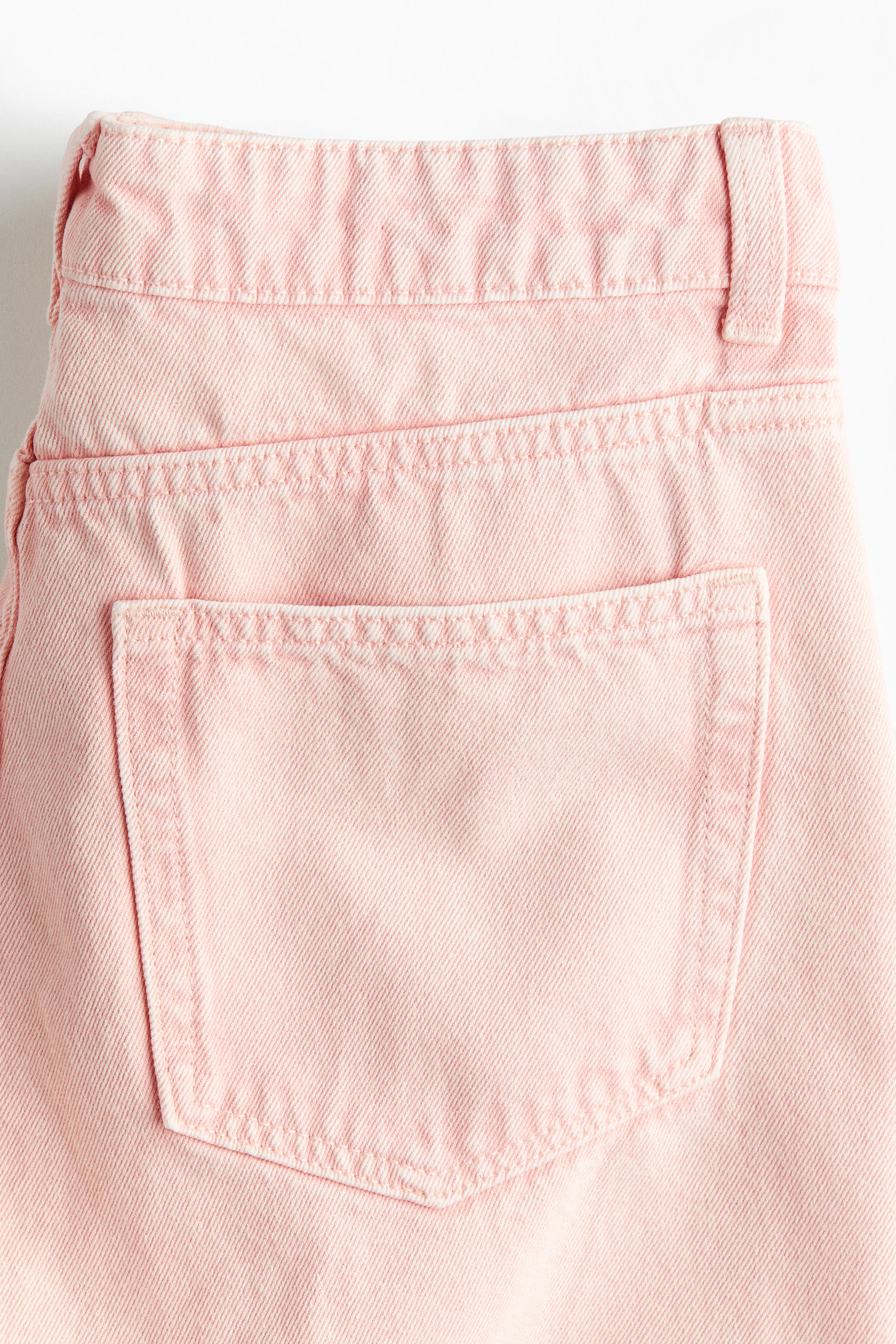 Raw-edge denim shorts