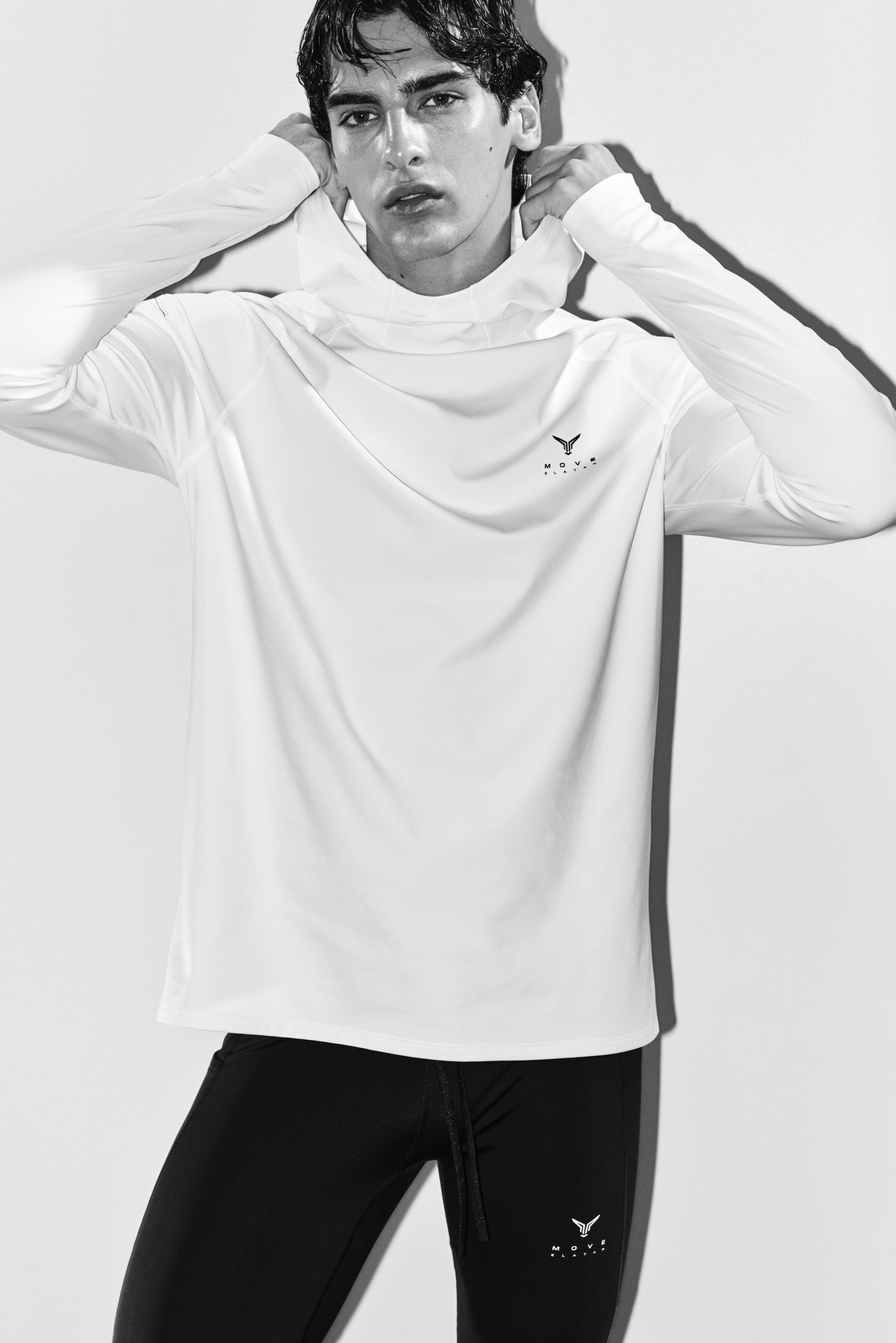 View larger image: Warming sports hoodie with ThermoMove™ - Cream/Move Zlatan - Men | H&M IN 3