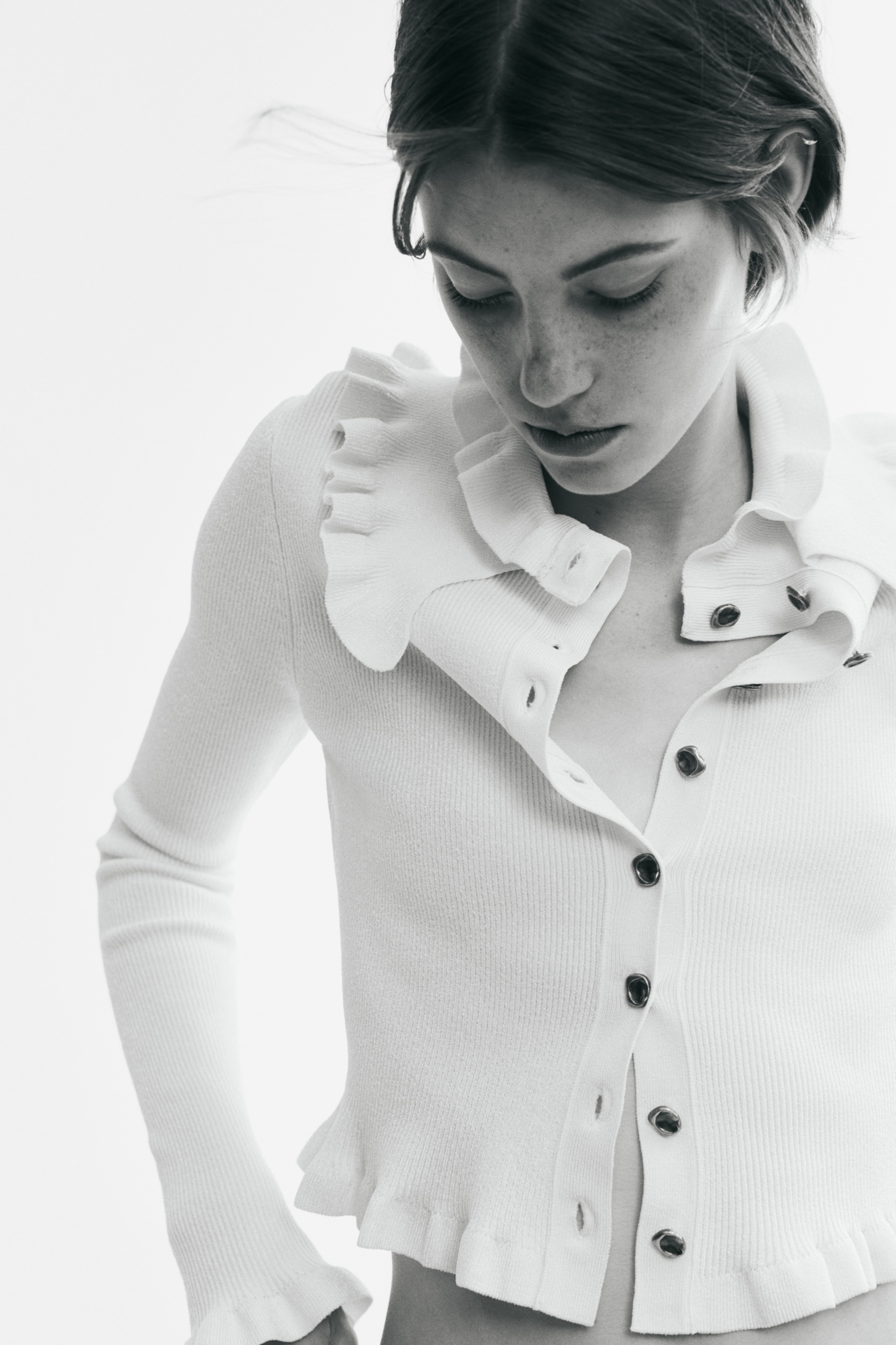 Ruffle-Trimmed Rib-Knit Top
