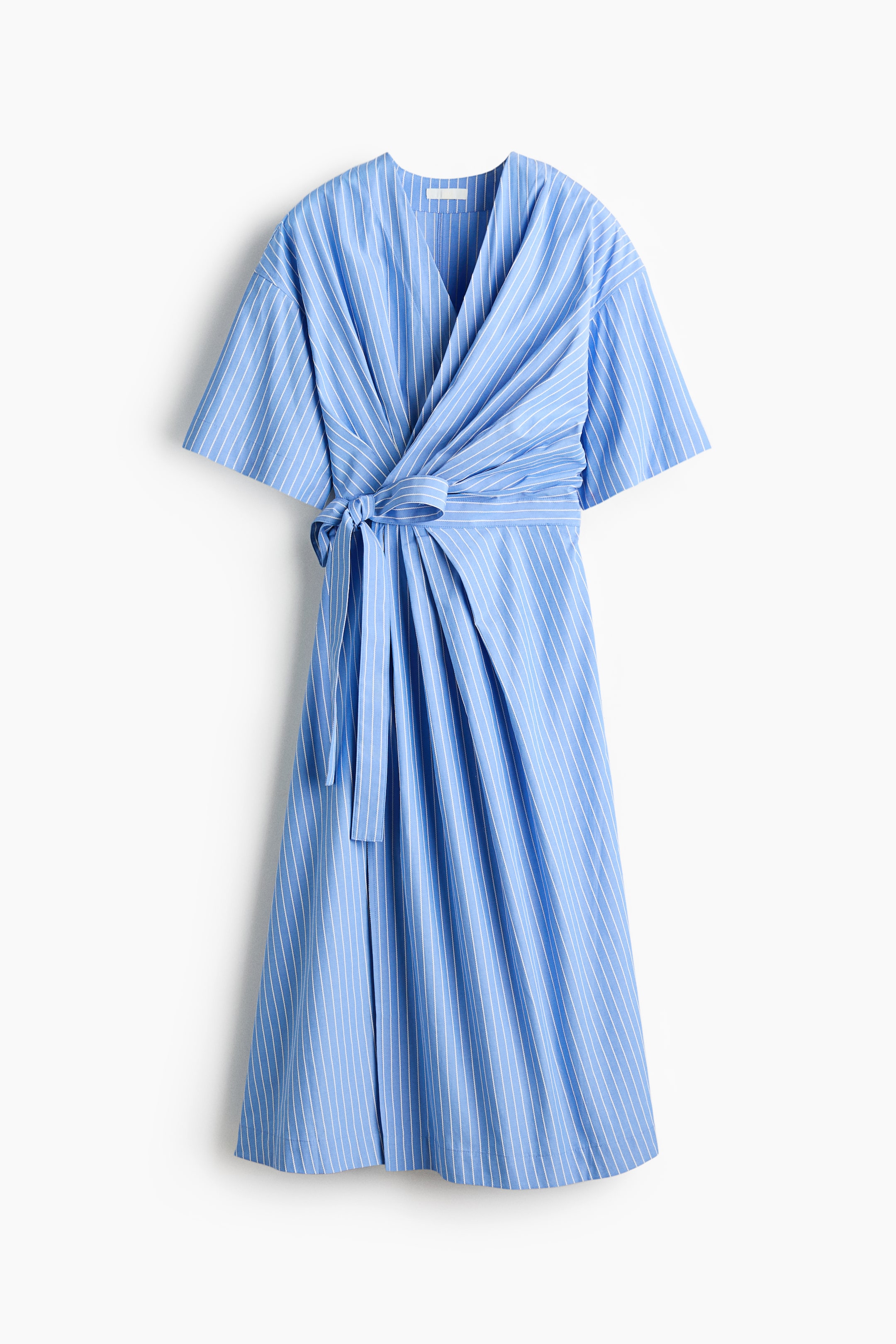 View larger image: A blue and white pinstriped wrap dress is showcased from the front, featuring a V-neckline and short, wide sleeves. A self-tie belt cinches the waist, creating gathers on the bodice and pleats on the skirt.