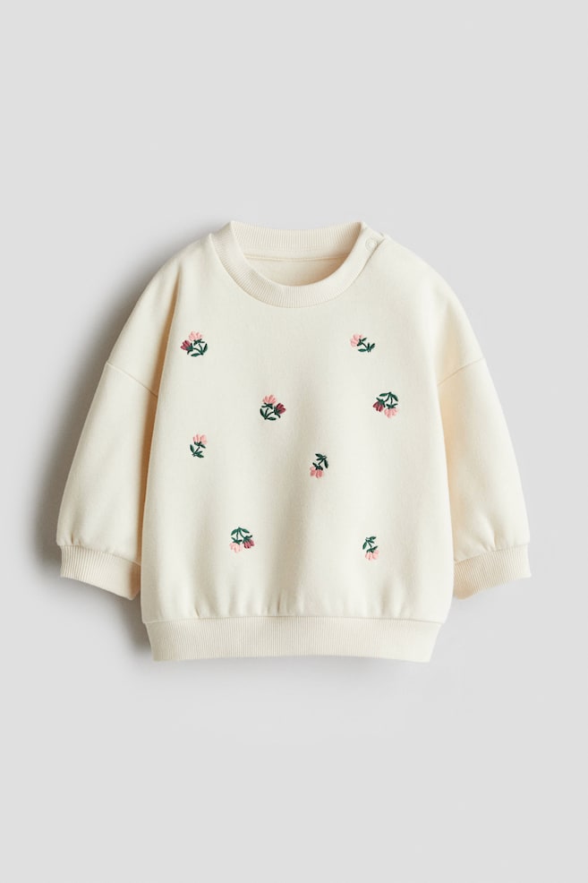 Sweatshirt mit Motiv - Cremefarben/Geblümt/Hellrosa/Bär/Marineblau/Schleifen - 1