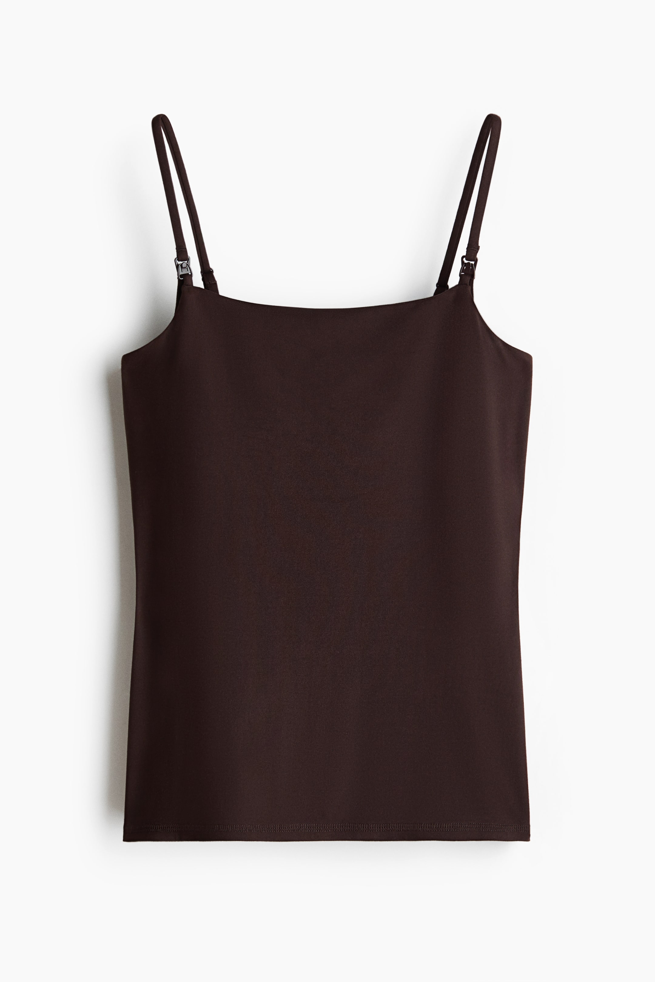 View larger image: A dark brown fitted nursing top is showcased from the front, crafted from a smooth jersey fabric. It features narrow, adjustable shoulder straps equipped with nursing clips.