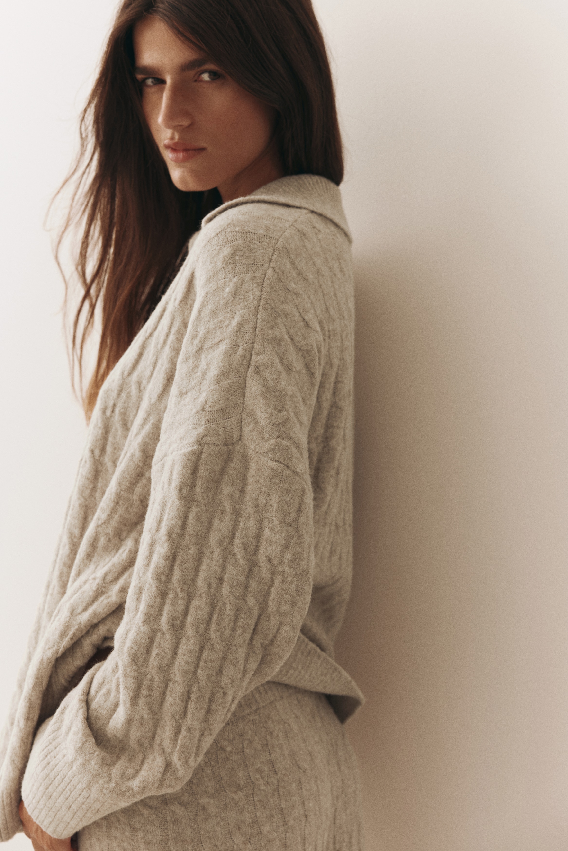 Cable-knit polo jumper