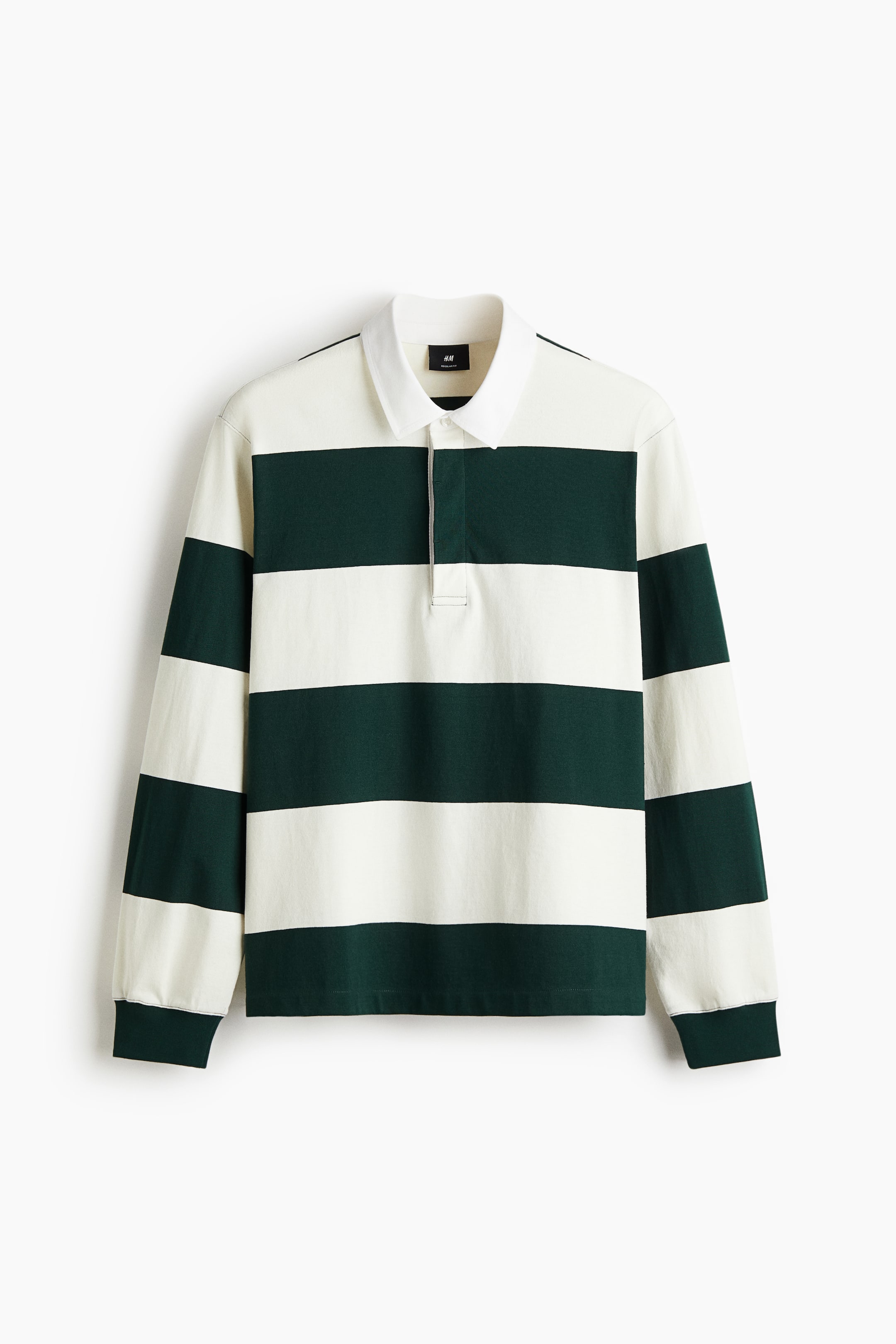 View larger image: A long-sleeved rugby shirt is presented from the front, featuring horizontal stripes in dark green and off-white. It has a white point collar, a three-button placket, and ribbed cuffs.