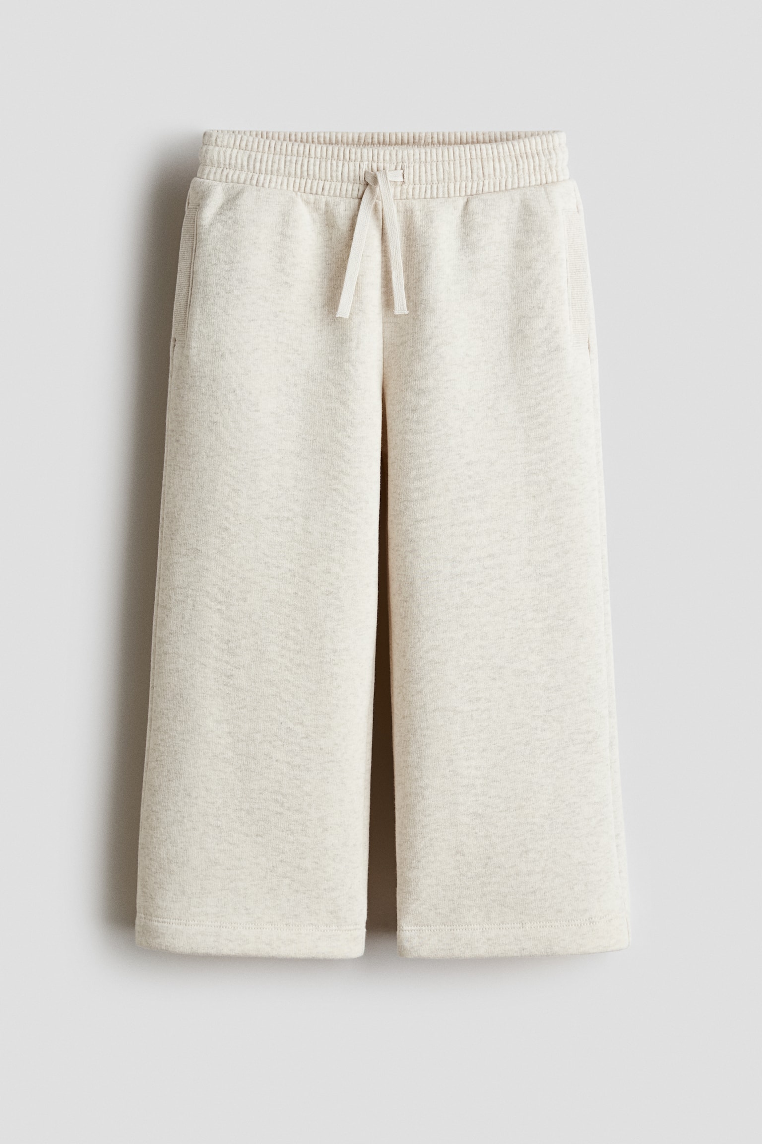 Szerokie joggersy z meszkiem wewnątrz - Jasnobeżowy melanż/Czarny/Jasnofioletowy/Ciemnoczerwony/Jasnoróżowy/Light beige/Leopard print/Różowy/Ciemnoszary/Serca