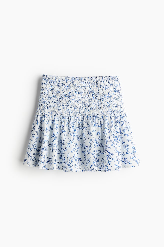 Minifalda con punto smock - Blanco/Floreado azul/Negro/Flores pequeñas - 1